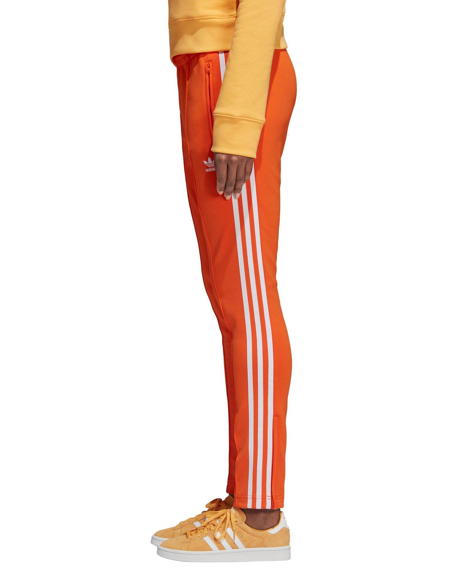 adidas Sst Track Pants in Orange Lyst