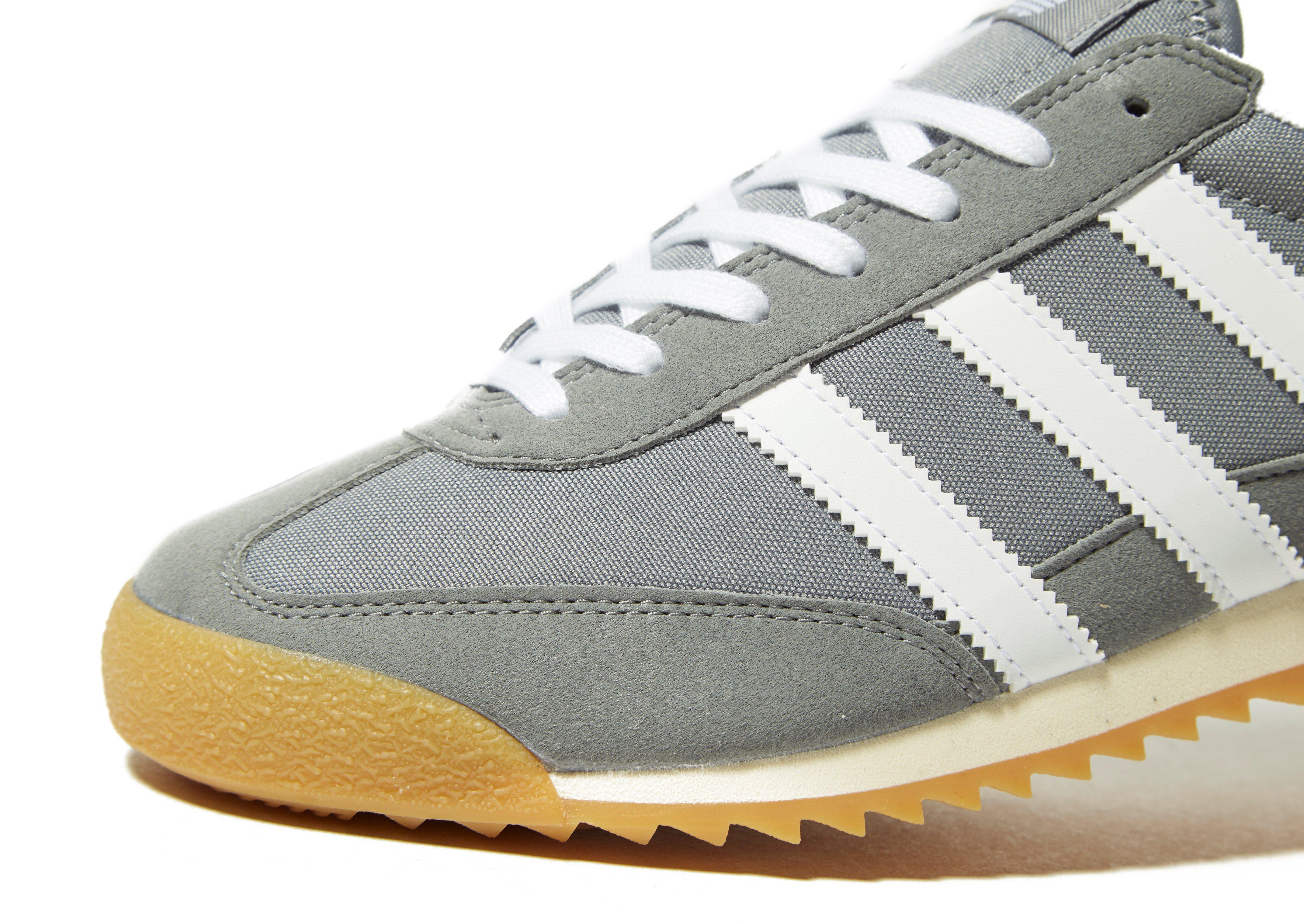 grey adidas dragon trainers