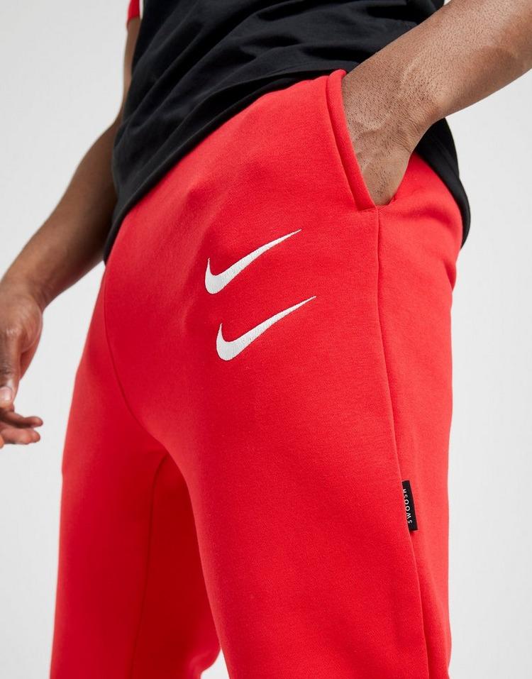 red nike double swoosh joggers