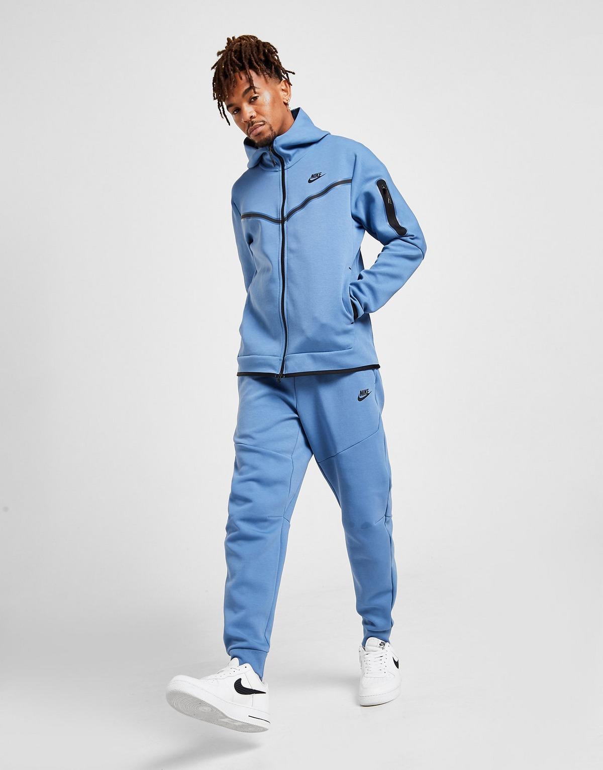 black and blue nike tracksuit