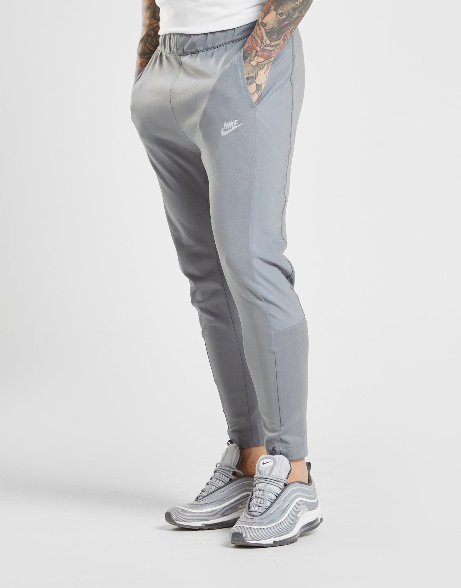gray nike track pants