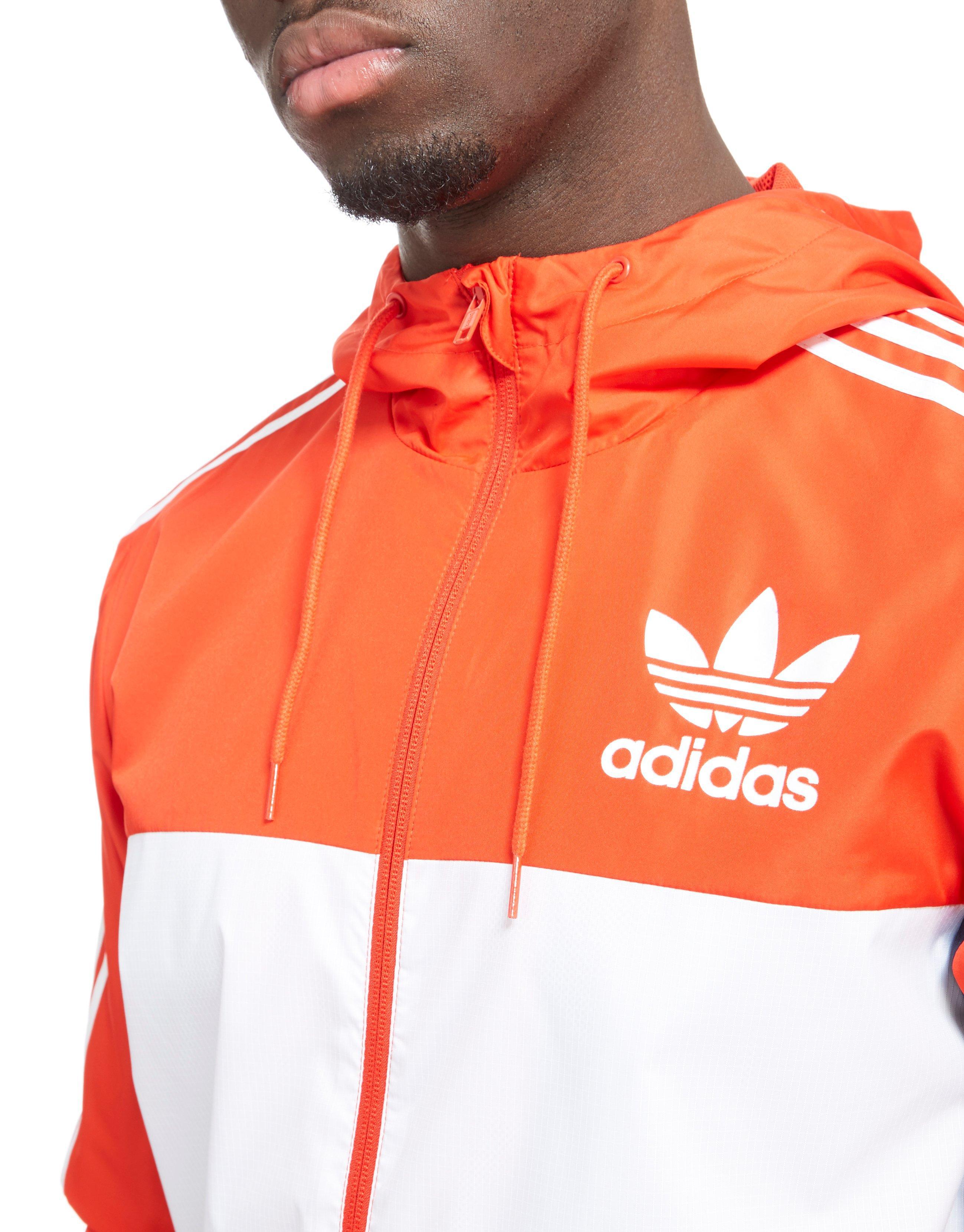 red and white adidas windbreaker