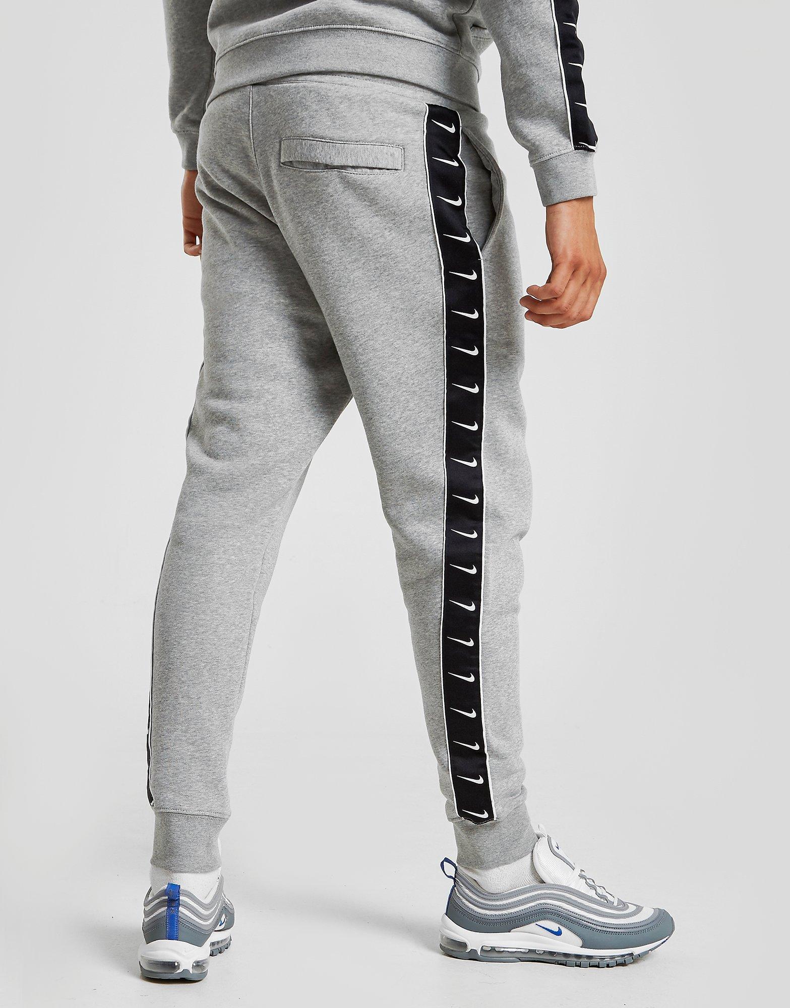 nike grey tape joggers