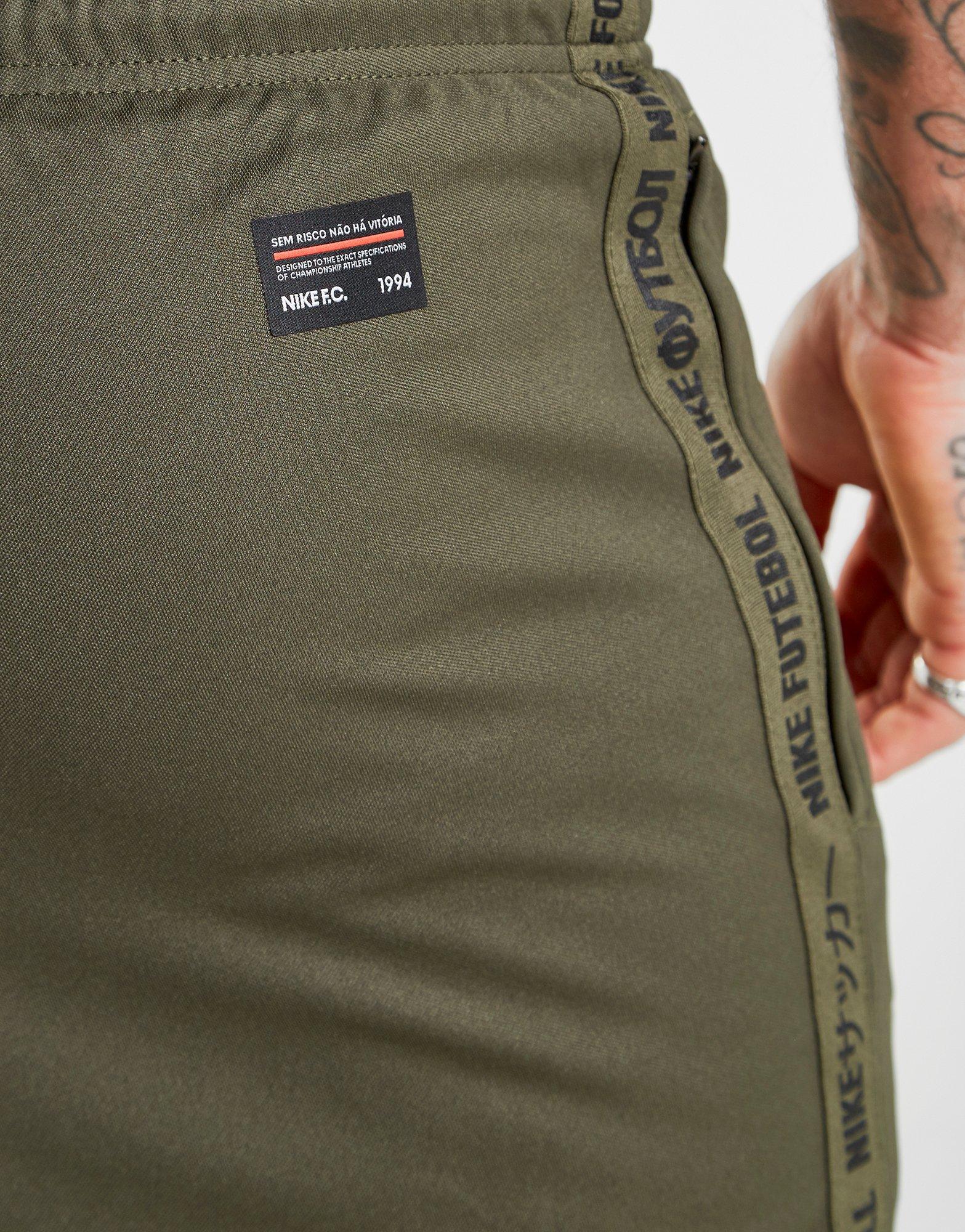 nike fc tape track pants