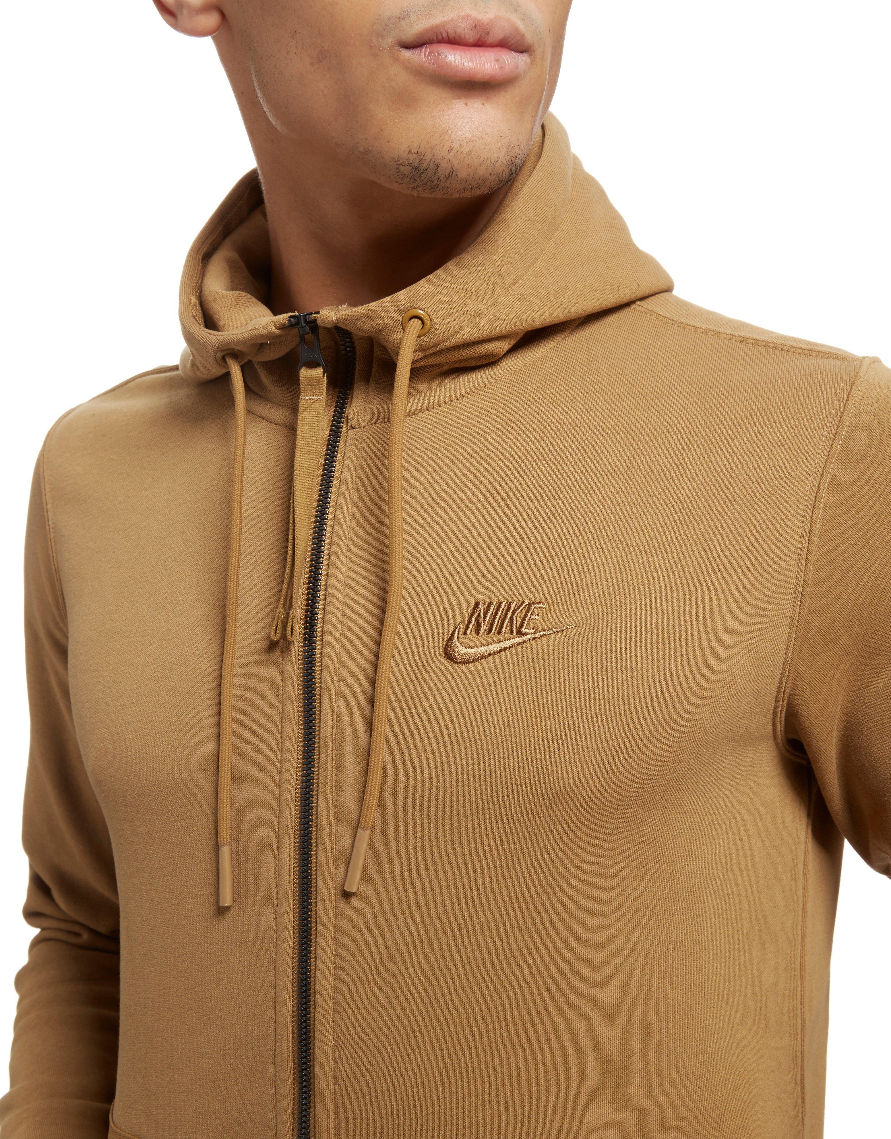 tan nike zip up