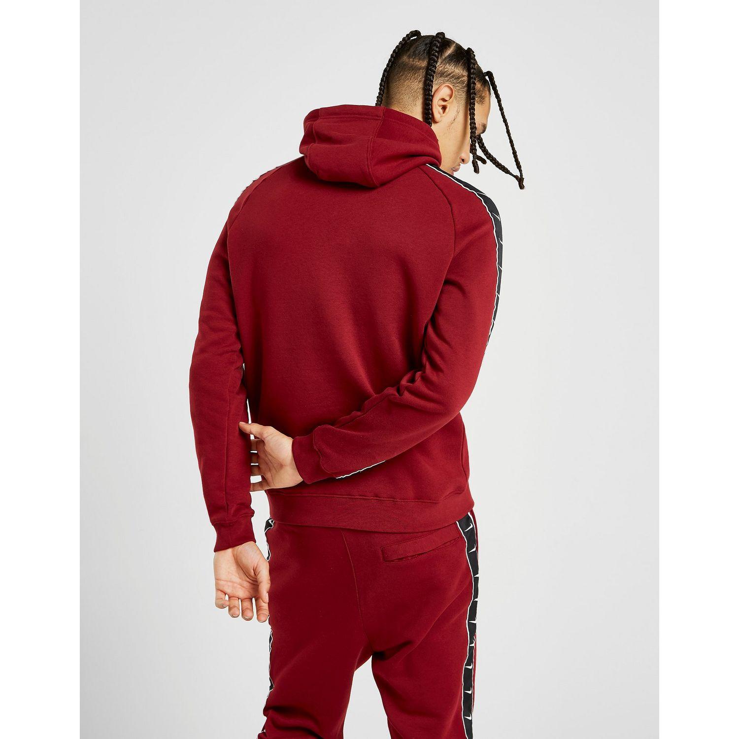 red nike hoodie and sweatpants
