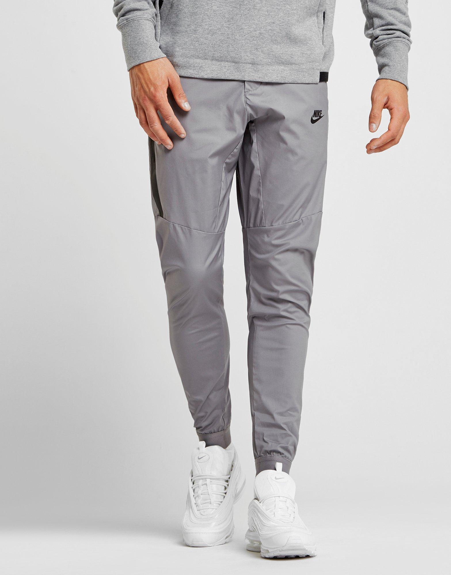 grey nike woven pants