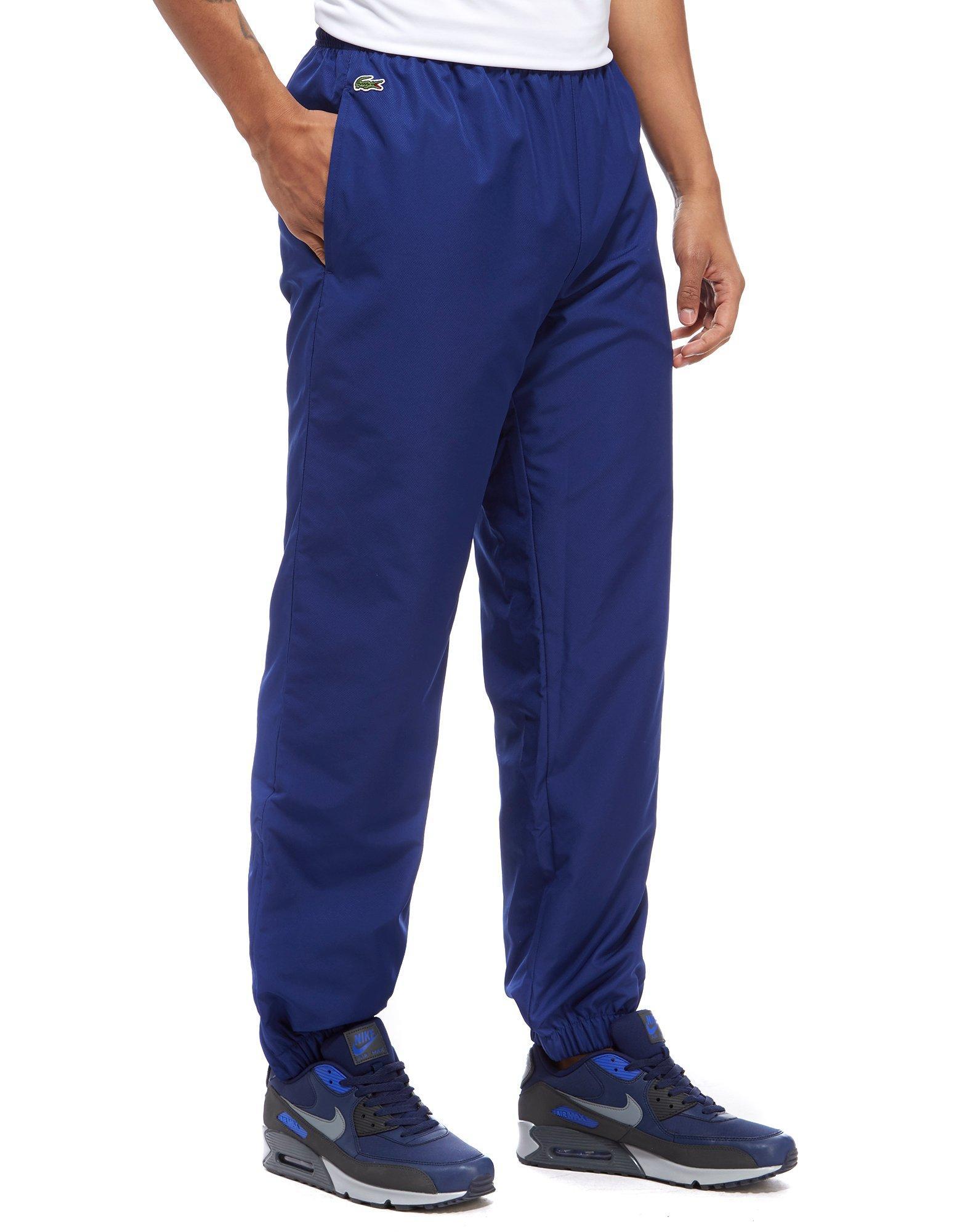 lacoste track pants blue