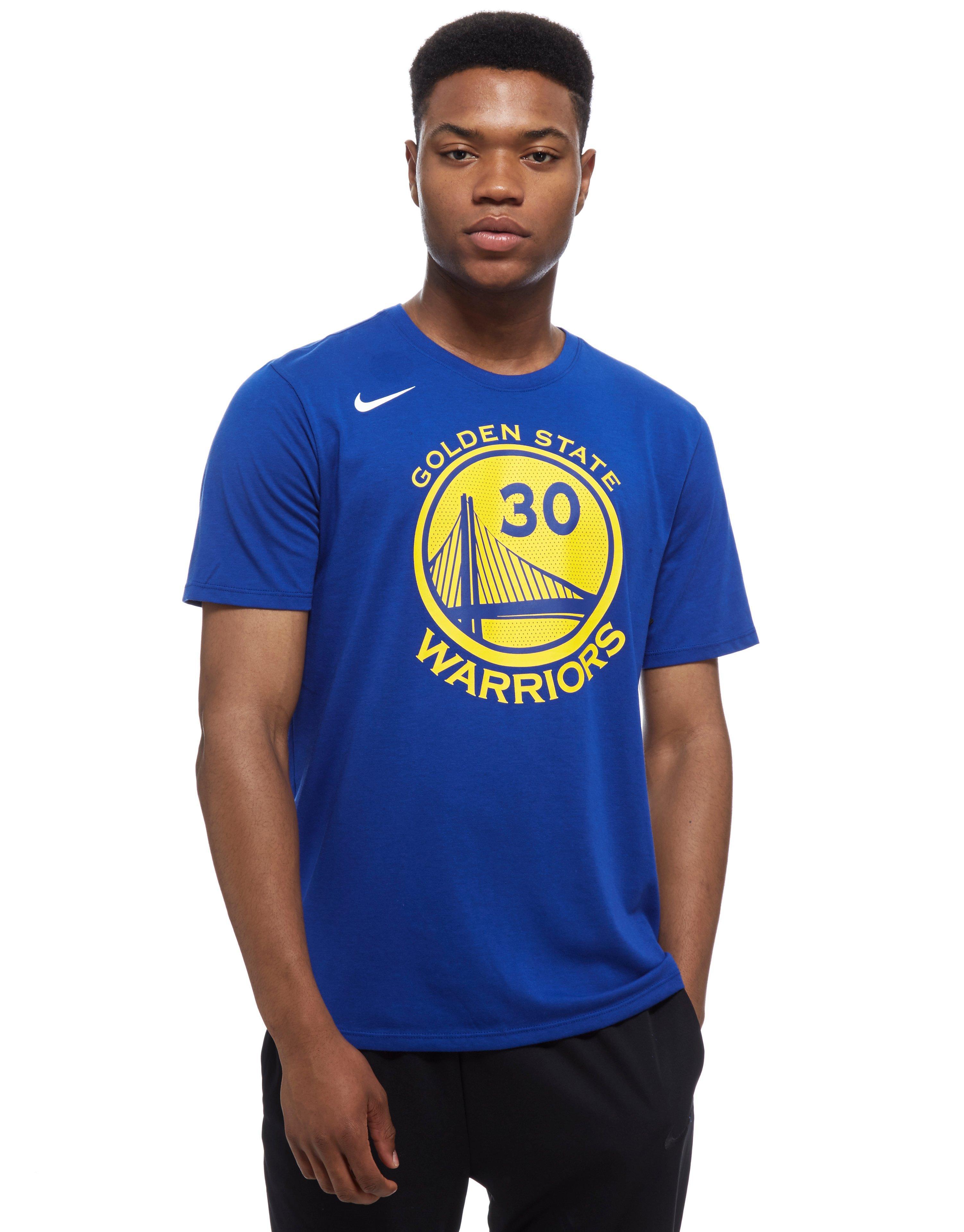 blue and gold nike shirt