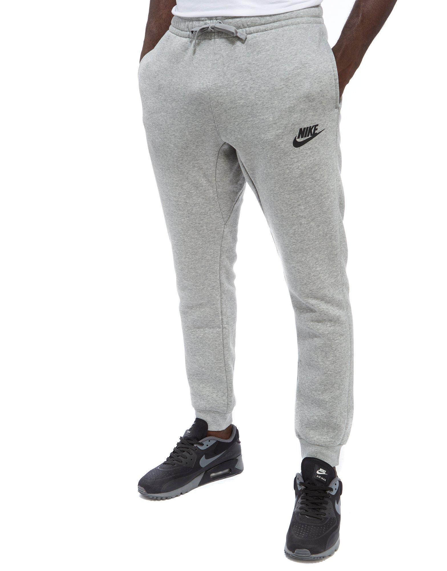 white nike track pants
