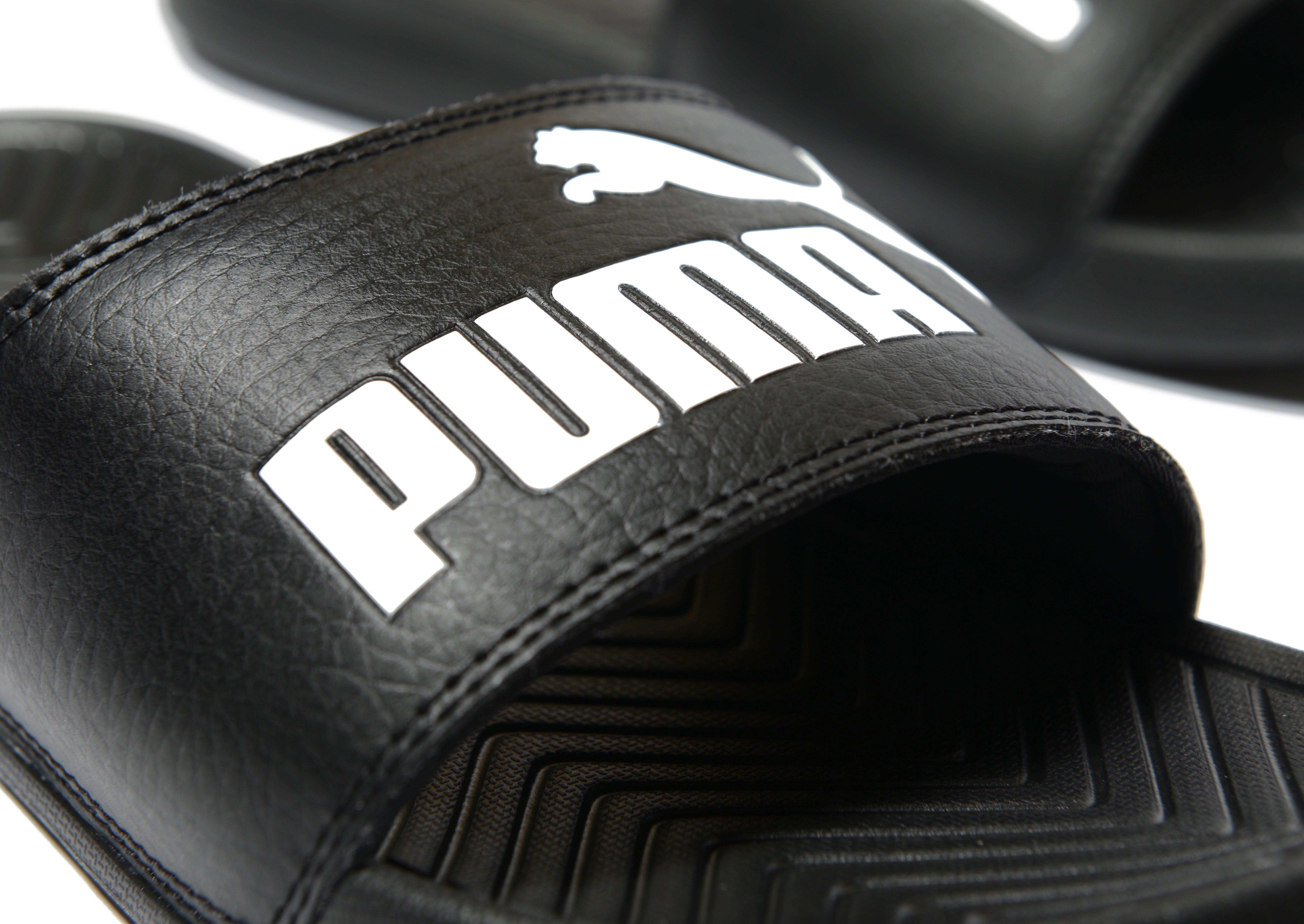 black puma slides fur