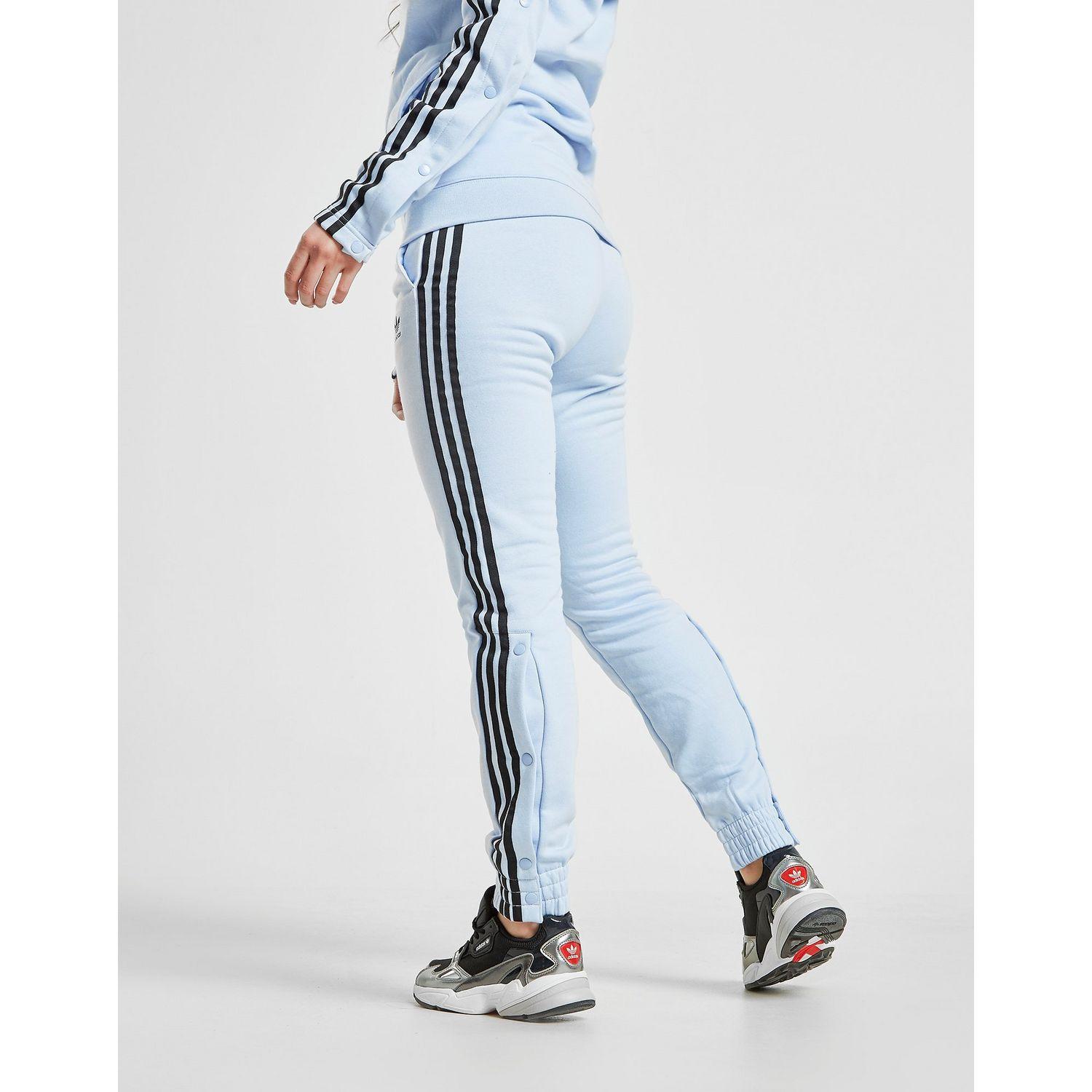 black joggers with blue stripe