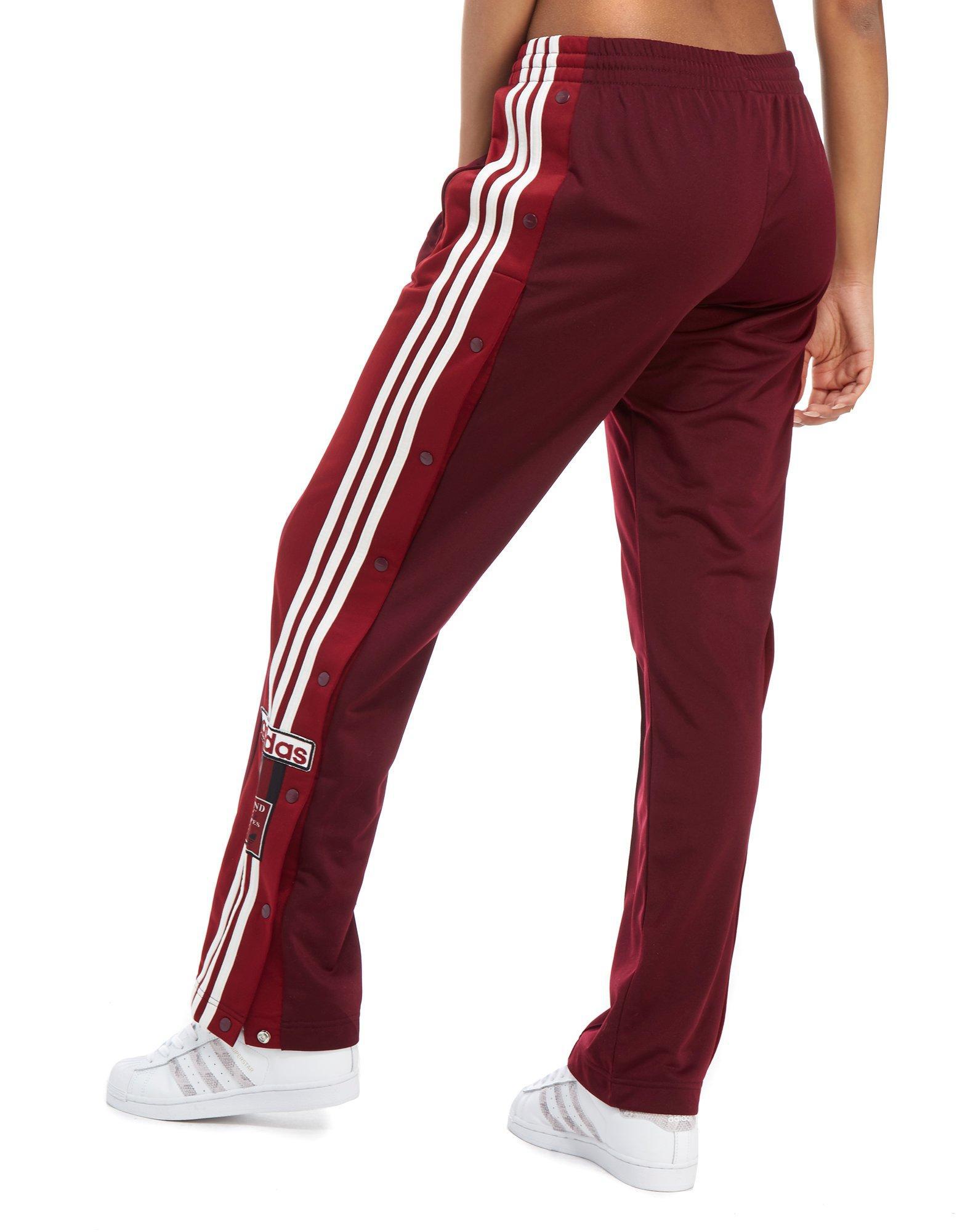 red adidas popper pants