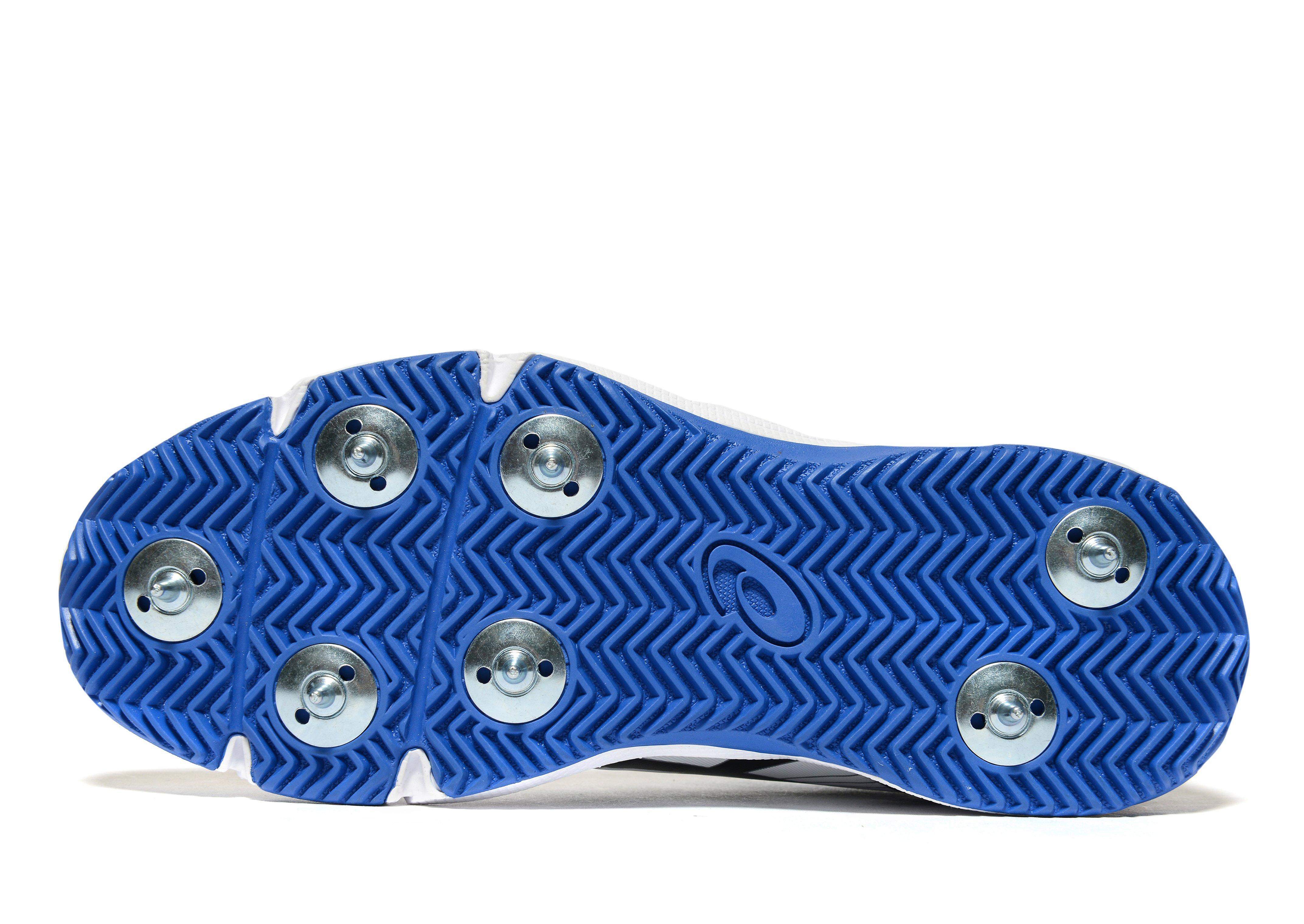 asics spikes junior