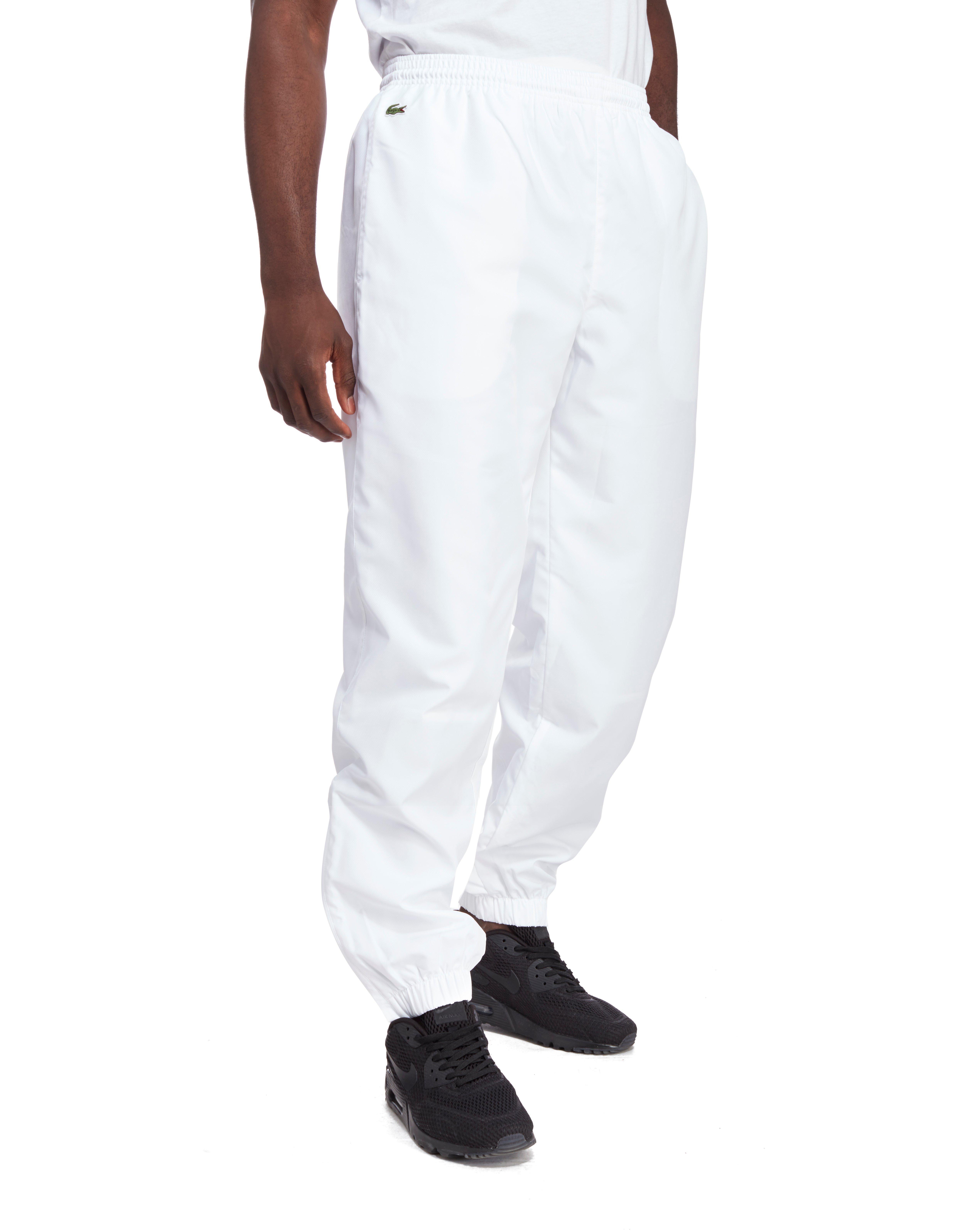 lacoste track pants white
