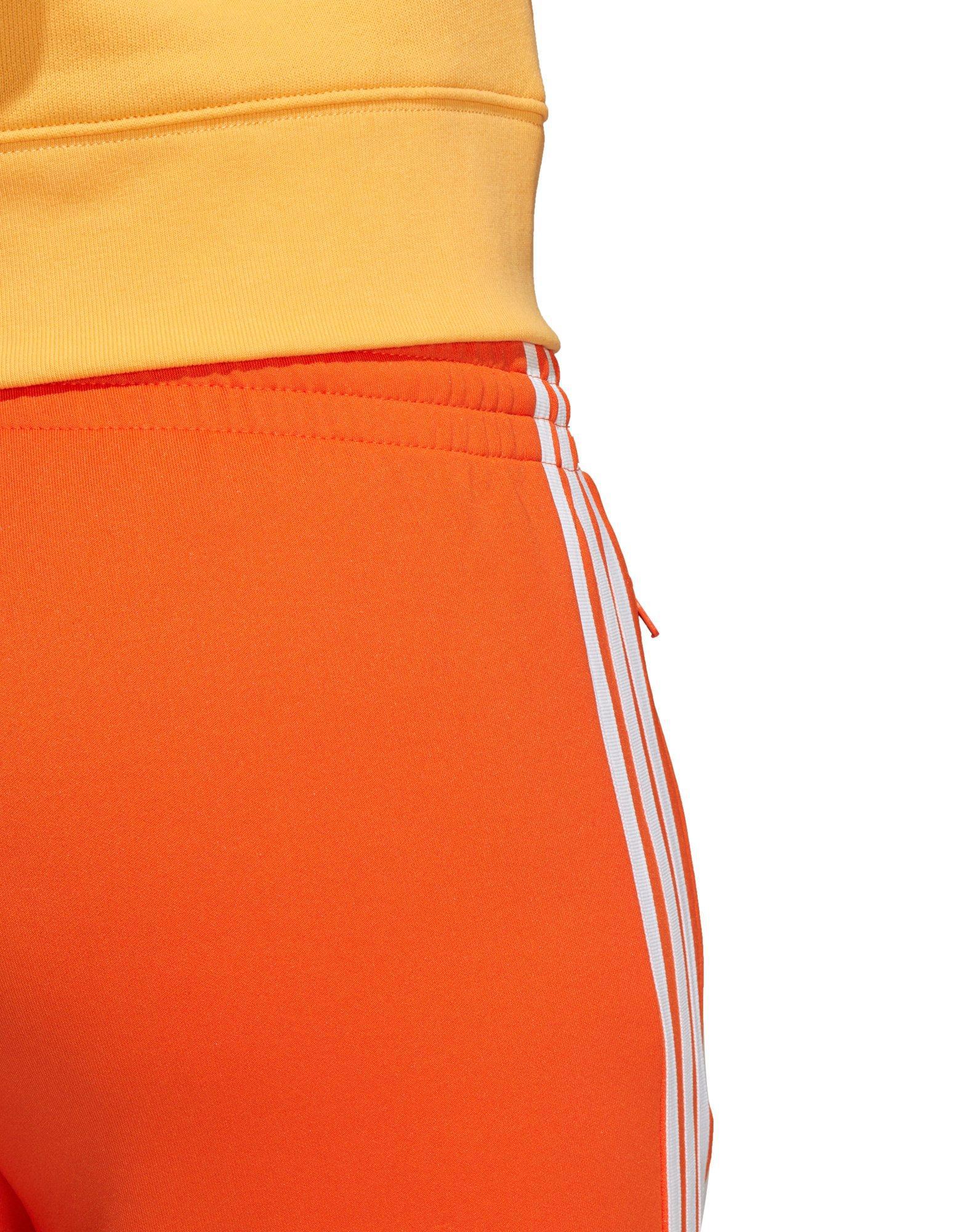 orange sst track pants