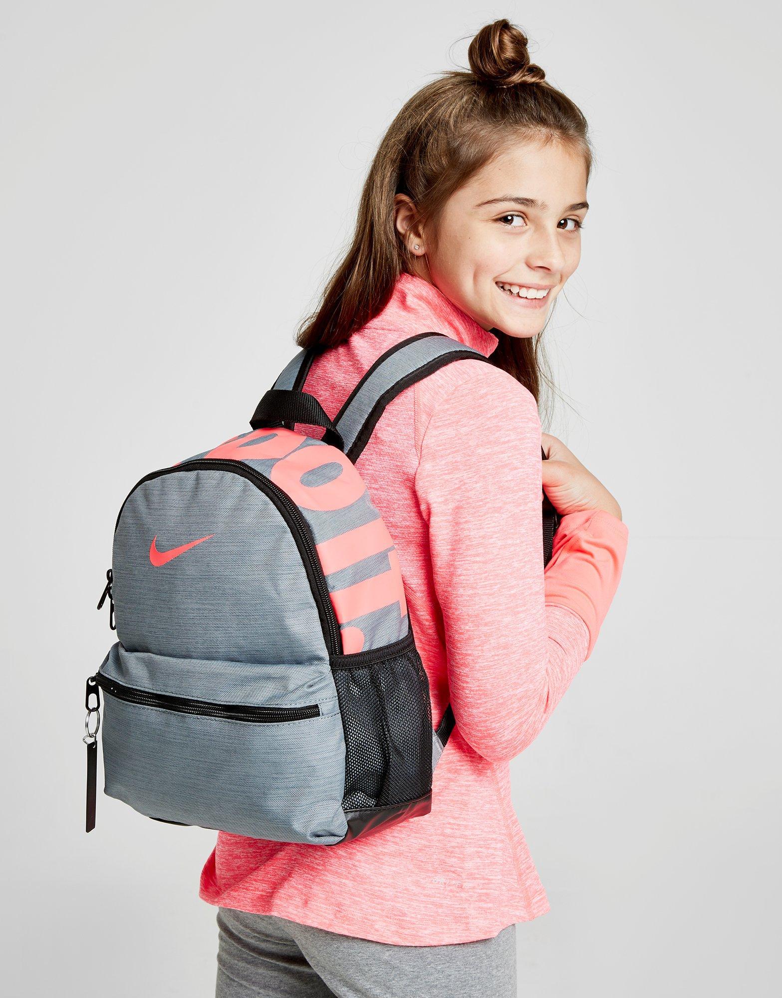 nike grey and iridescent just do it mini backpack
