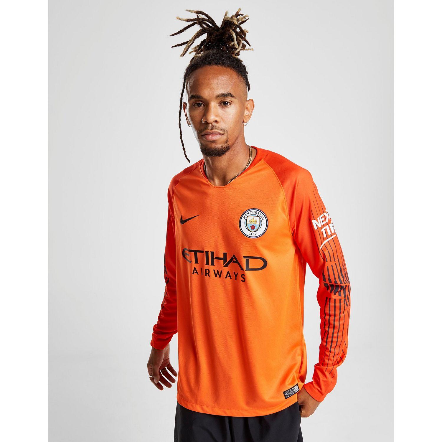 man city orange jersey