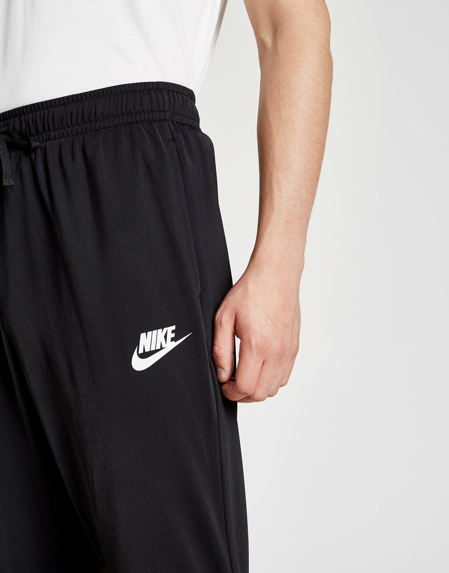 nike division poly track top