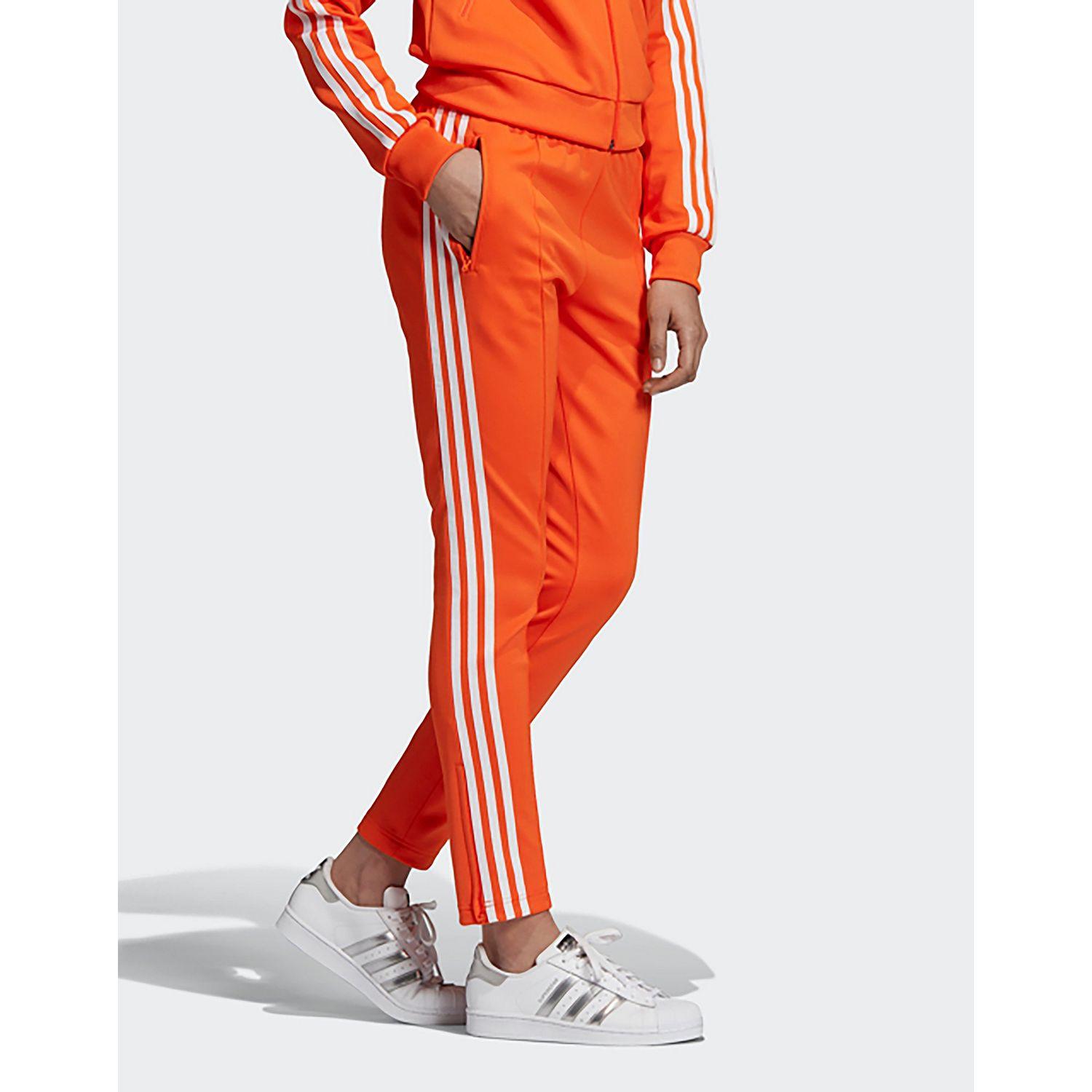 orange adidas jogging suit