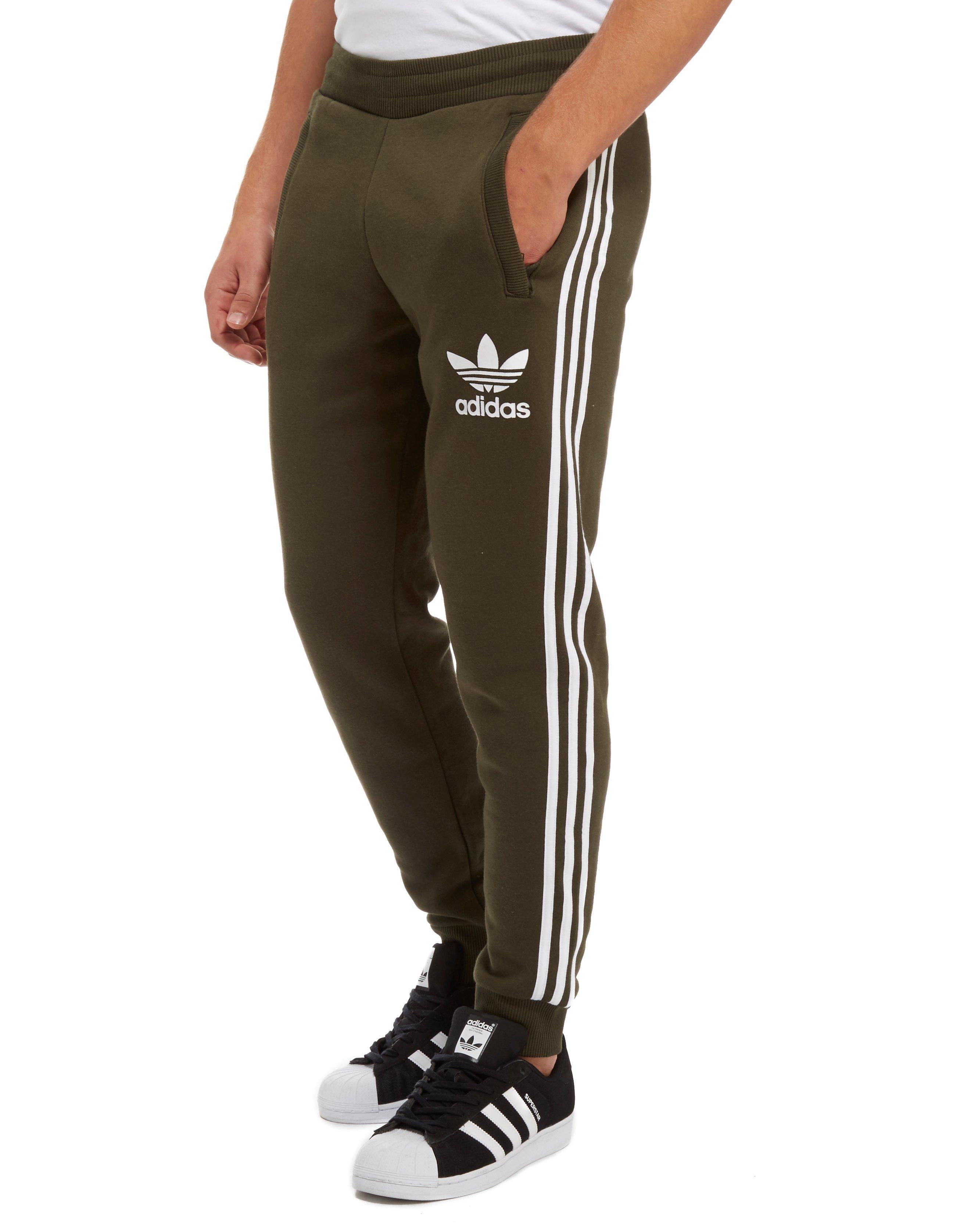 green adidas joggers mens