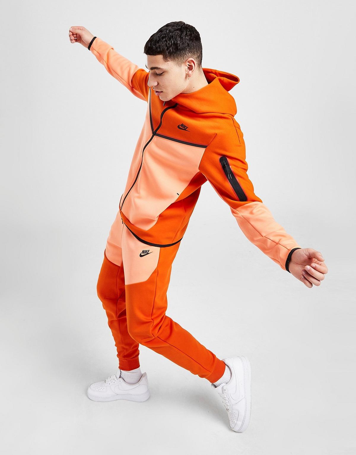 Nike tech pants orange Clearance