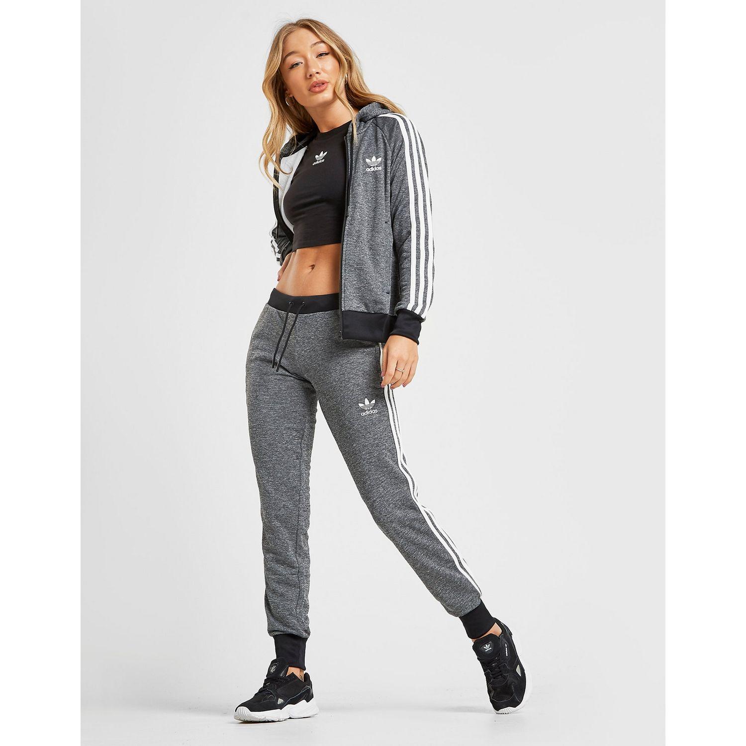 adidas track pants black with red stripes
