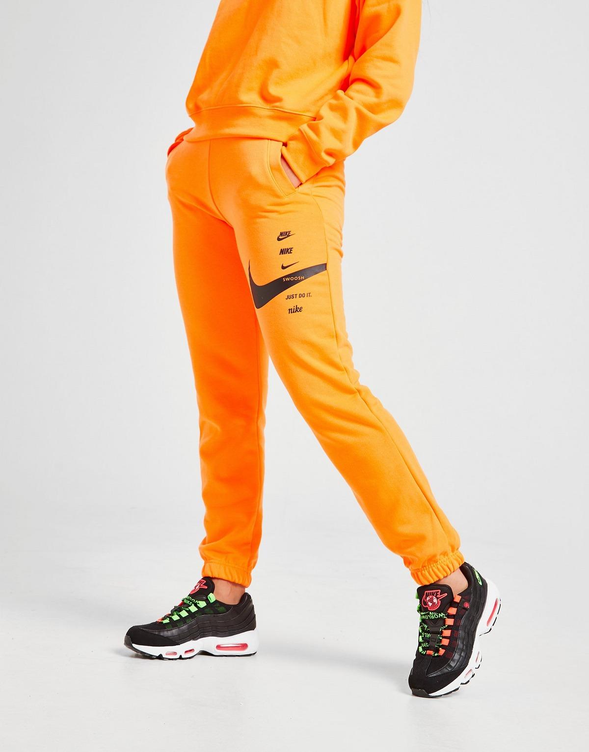 Nike Swoosh Joggers in Orange - Lyst