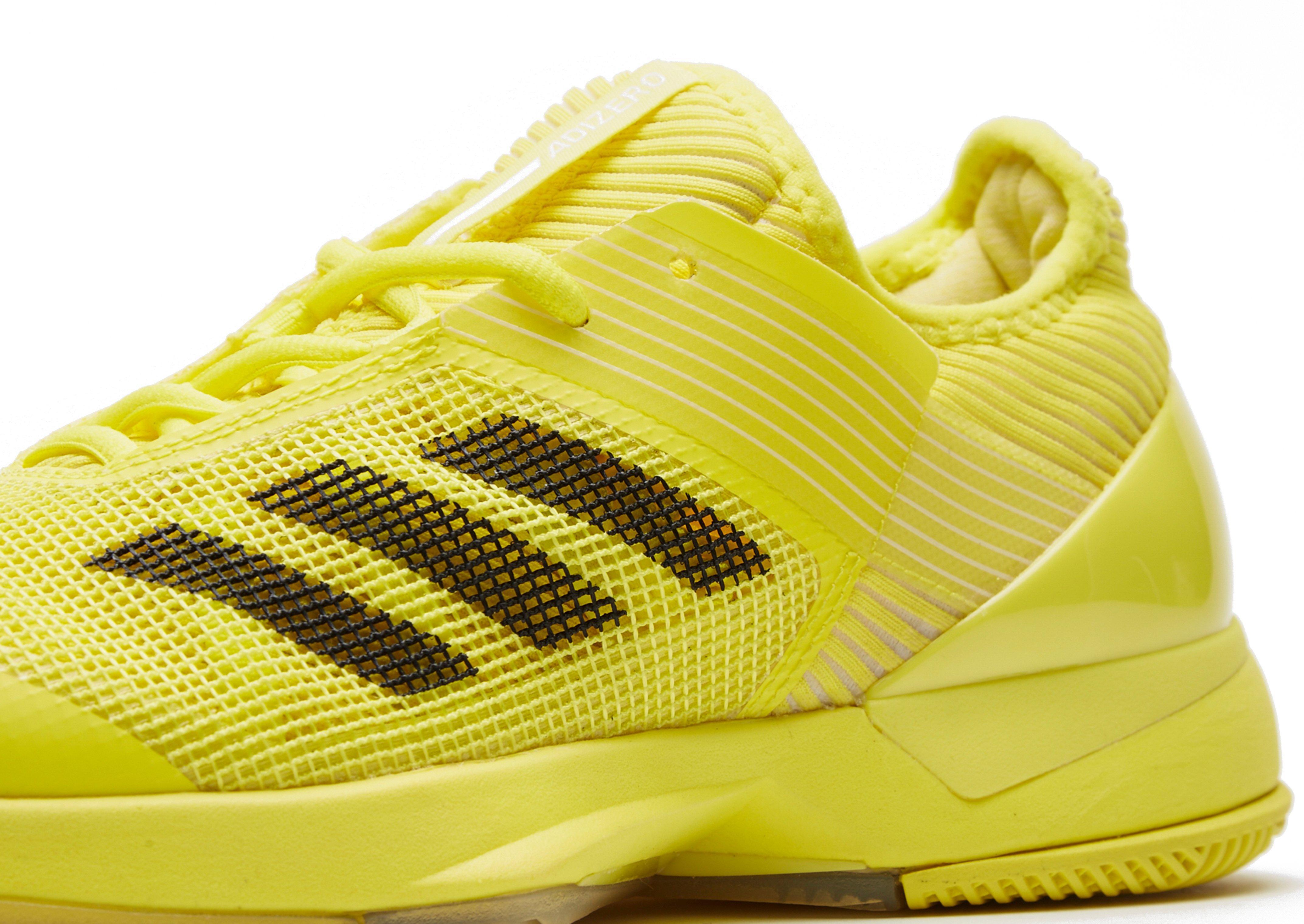 black and yellow womens sneakers