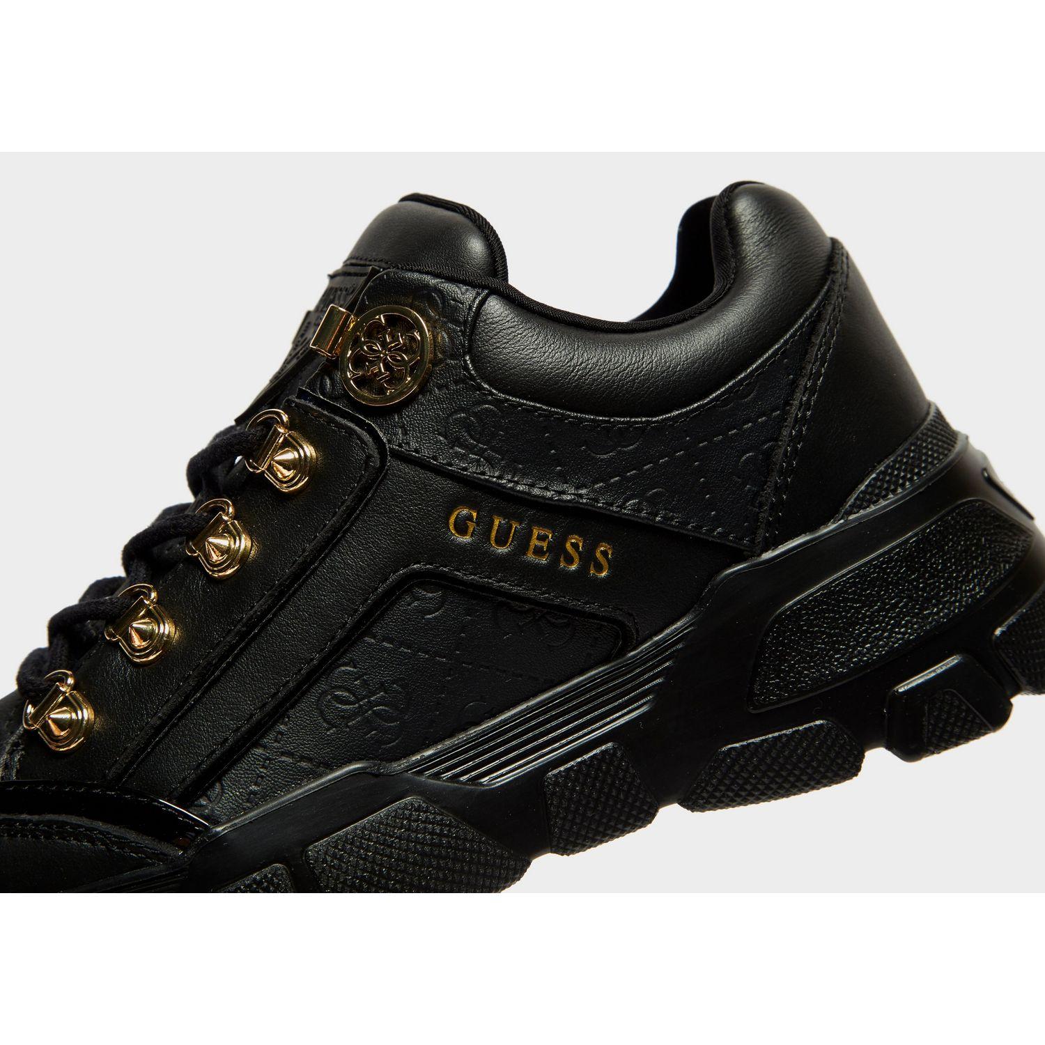 guess black and gold shoes