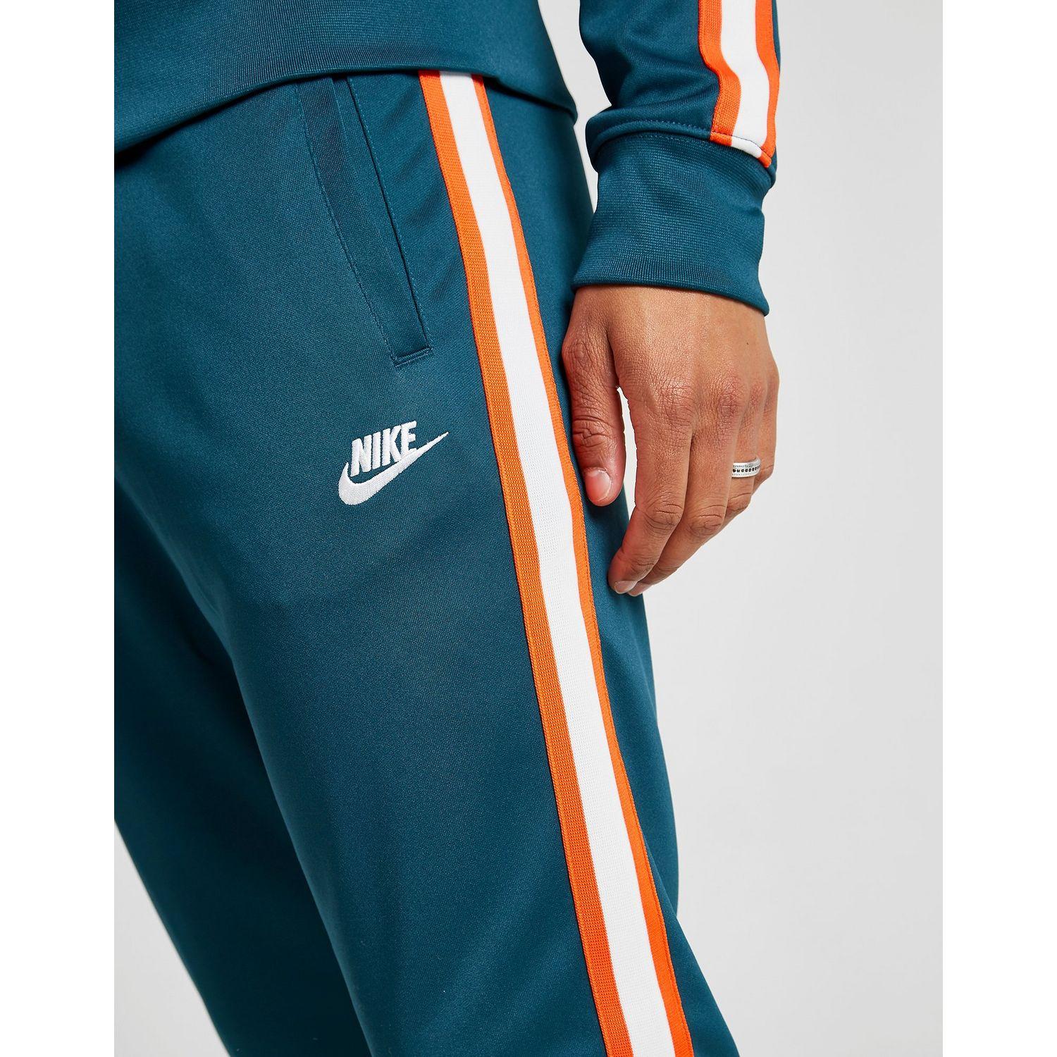 grey and orange nike tribute tracksuit