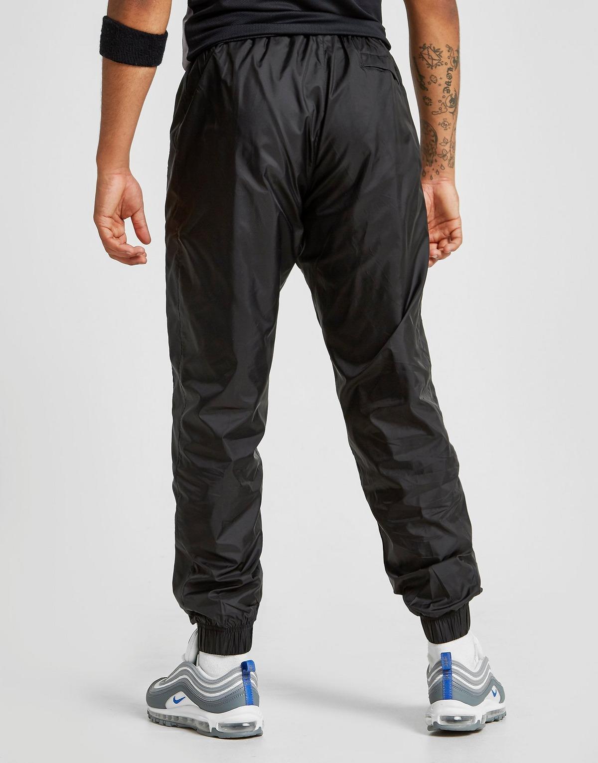 nike woven tracksuit bottoms