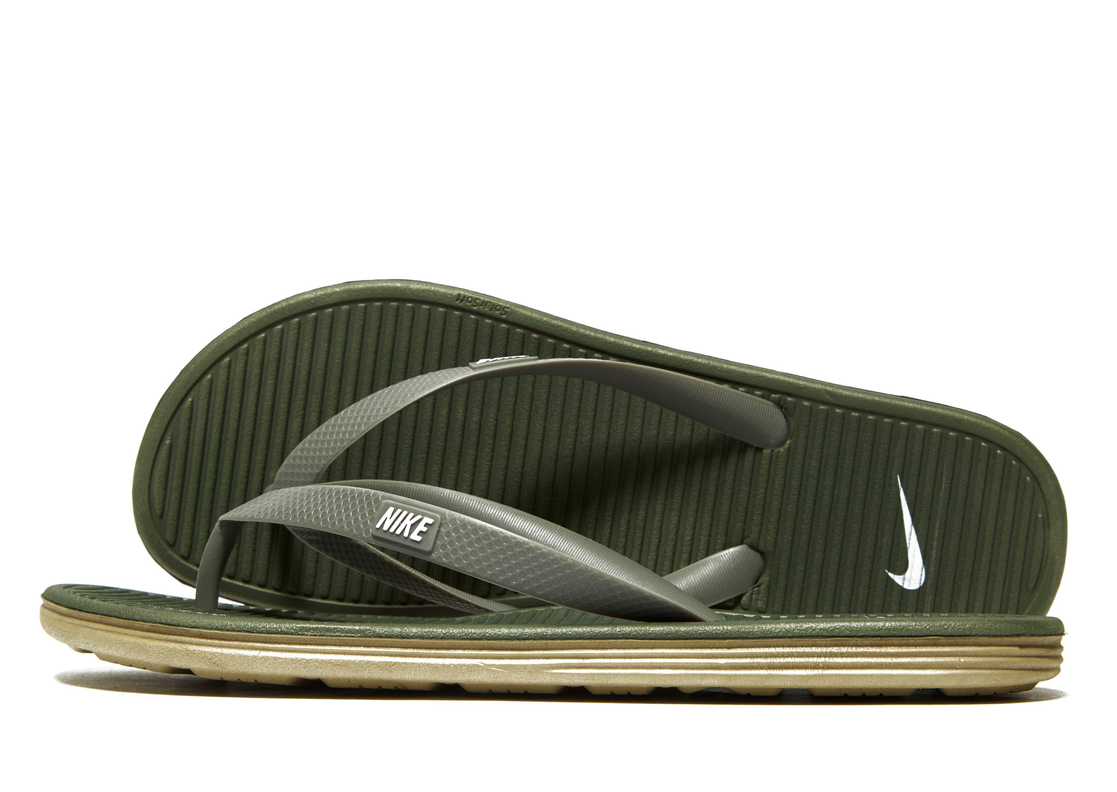 nike green flip flops