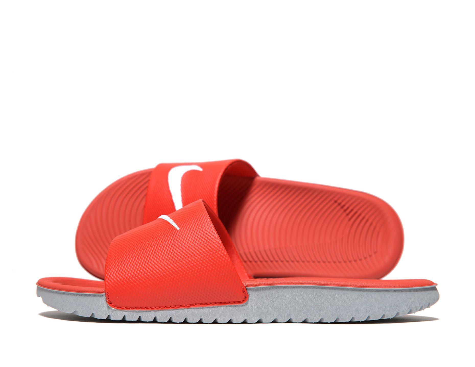 nike flip flops junior