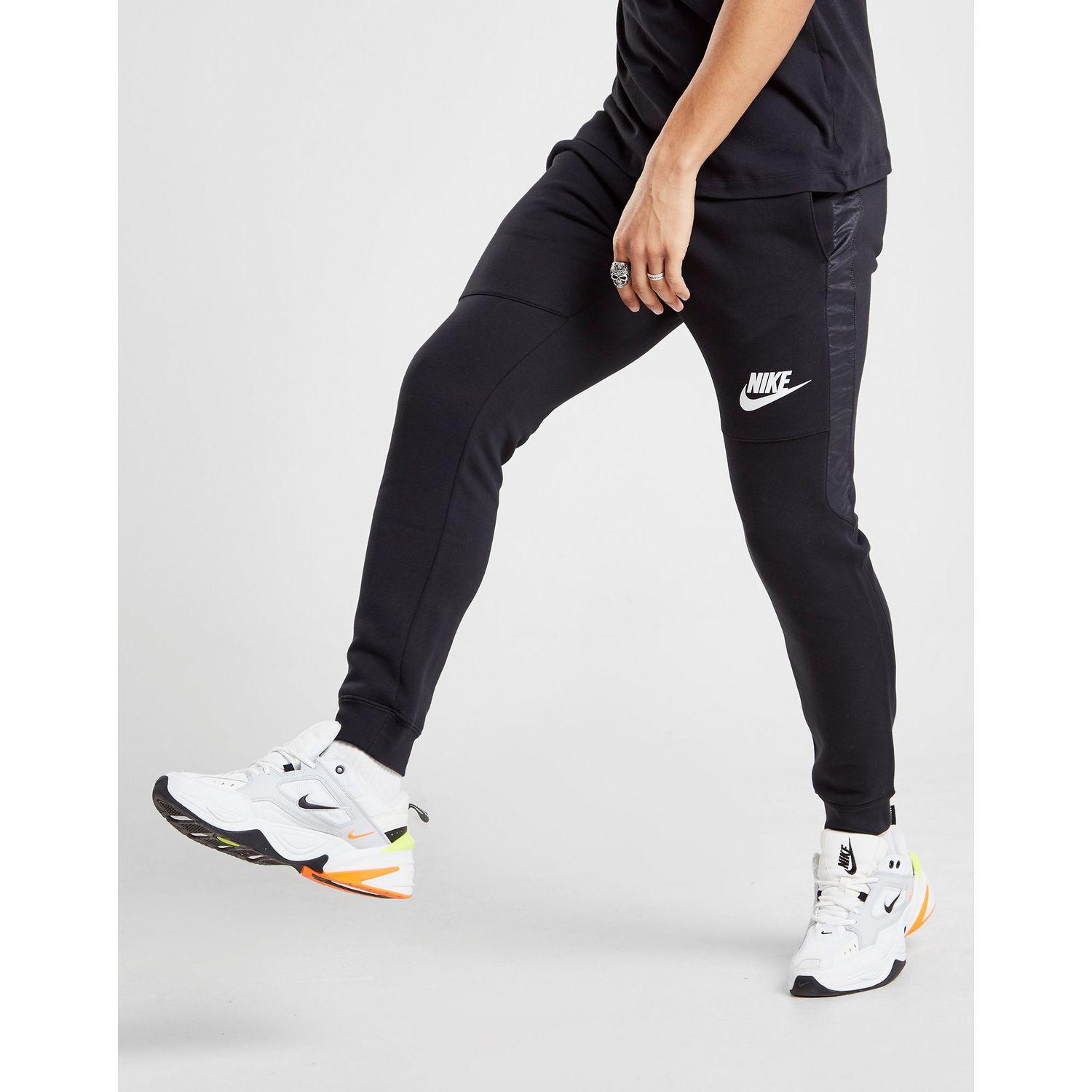 Nike Hybrid Fleece Joggers in Black for Men - Lyst