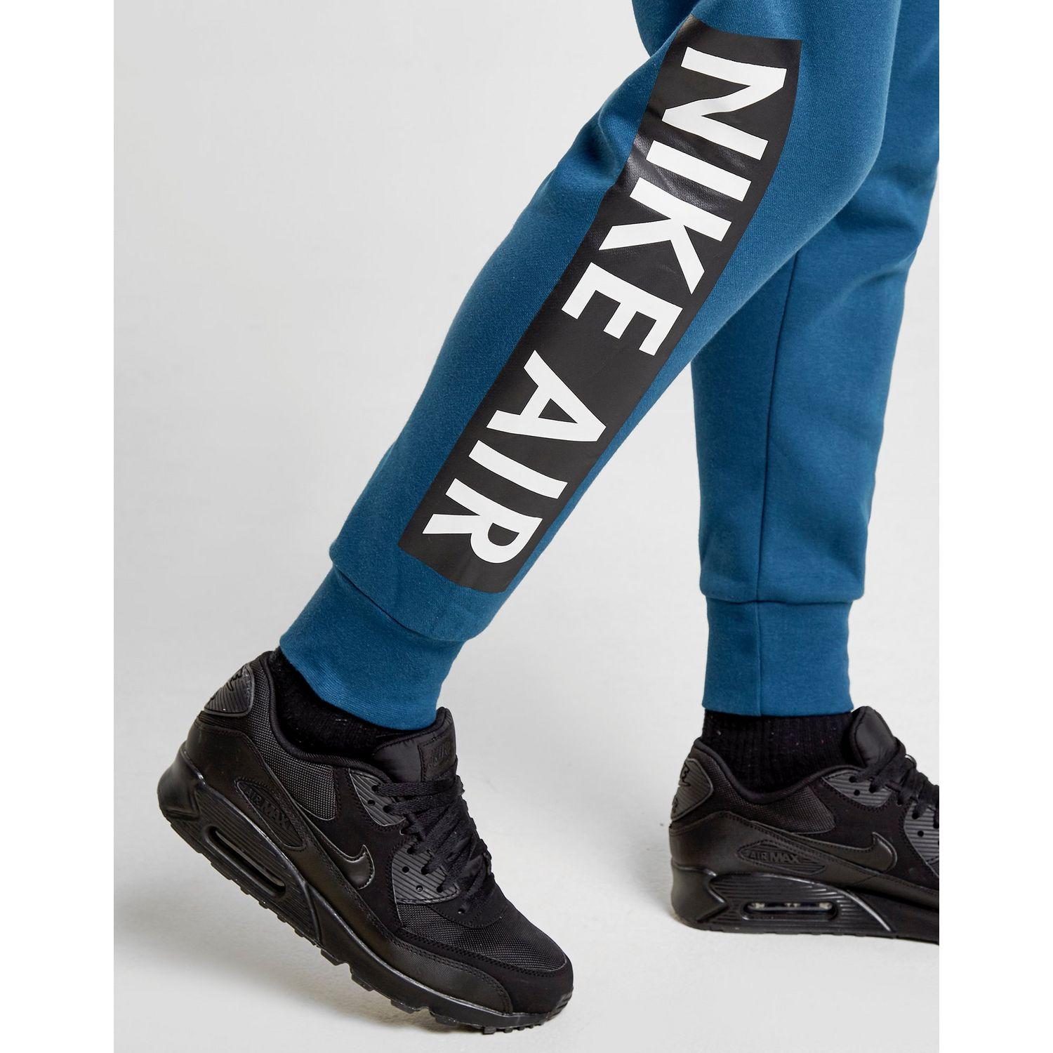 nike air leg logo track pants