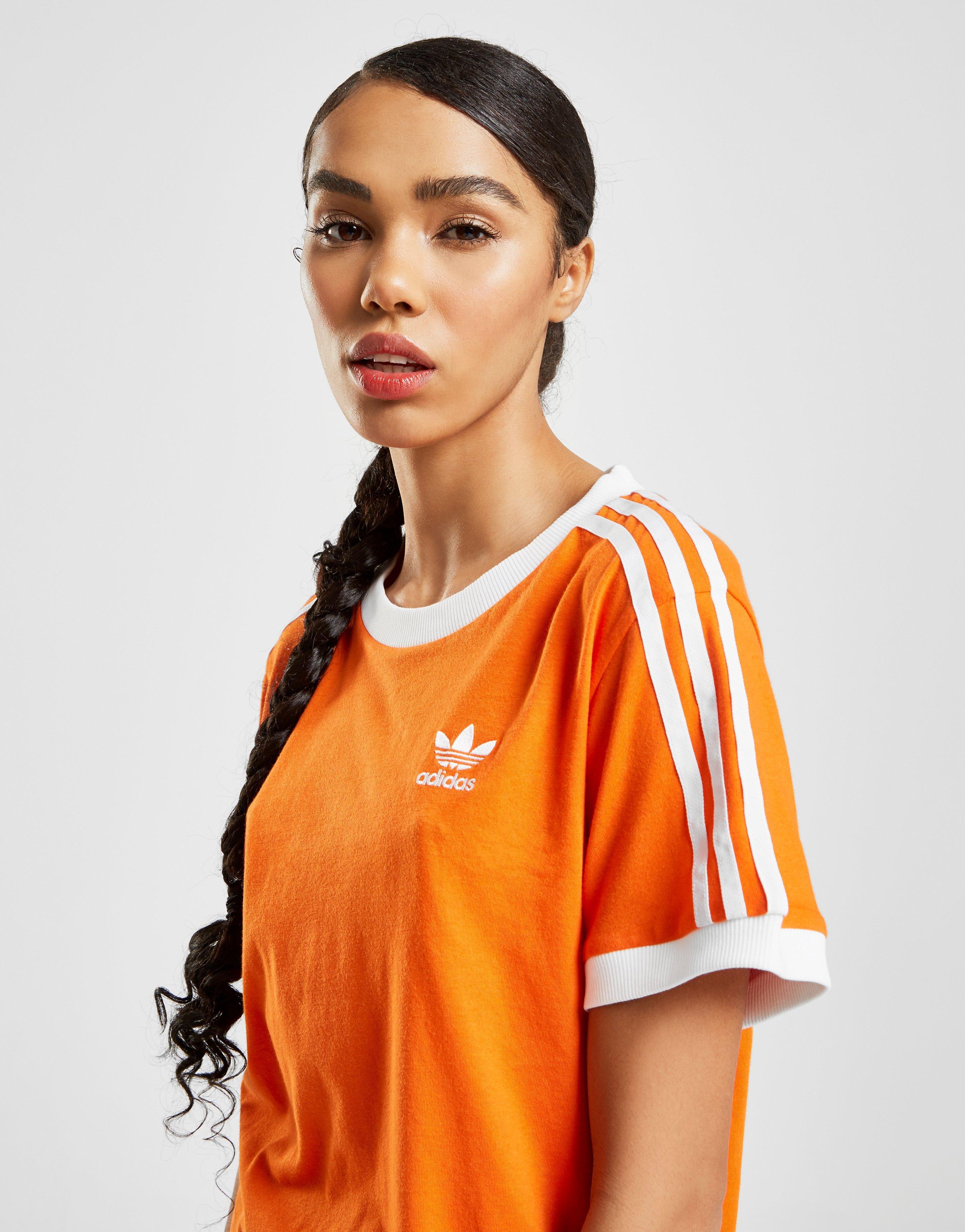 white and orange adidas t shirt