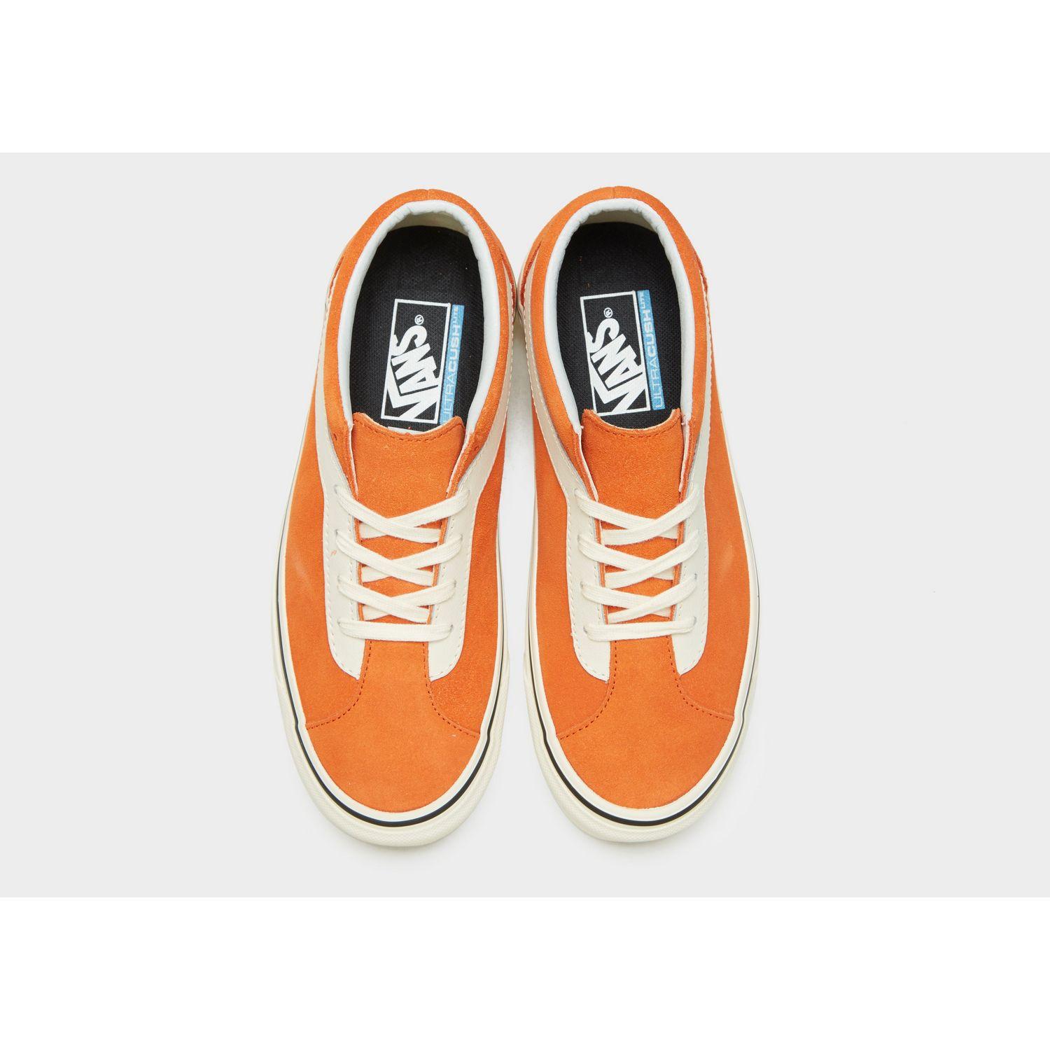 orange and cream vans