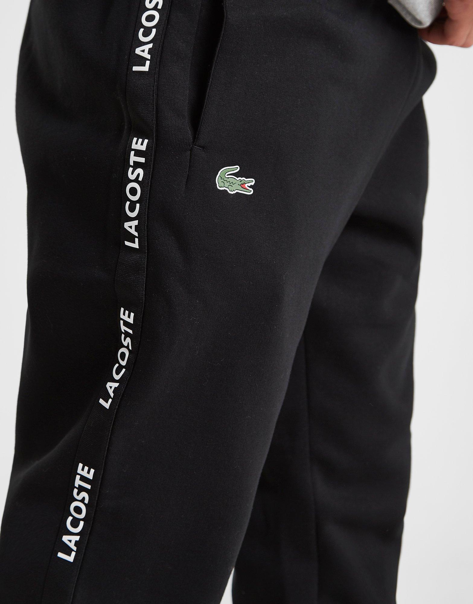 lacoste tape woven track pants