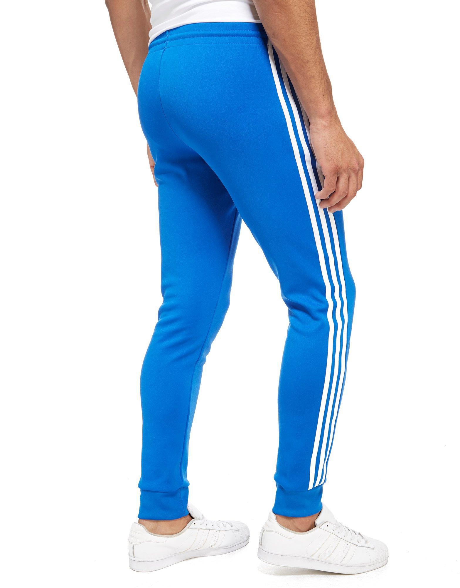 adidas Originals Synthetic 3-stripes Superstar Track Pants in Blue for