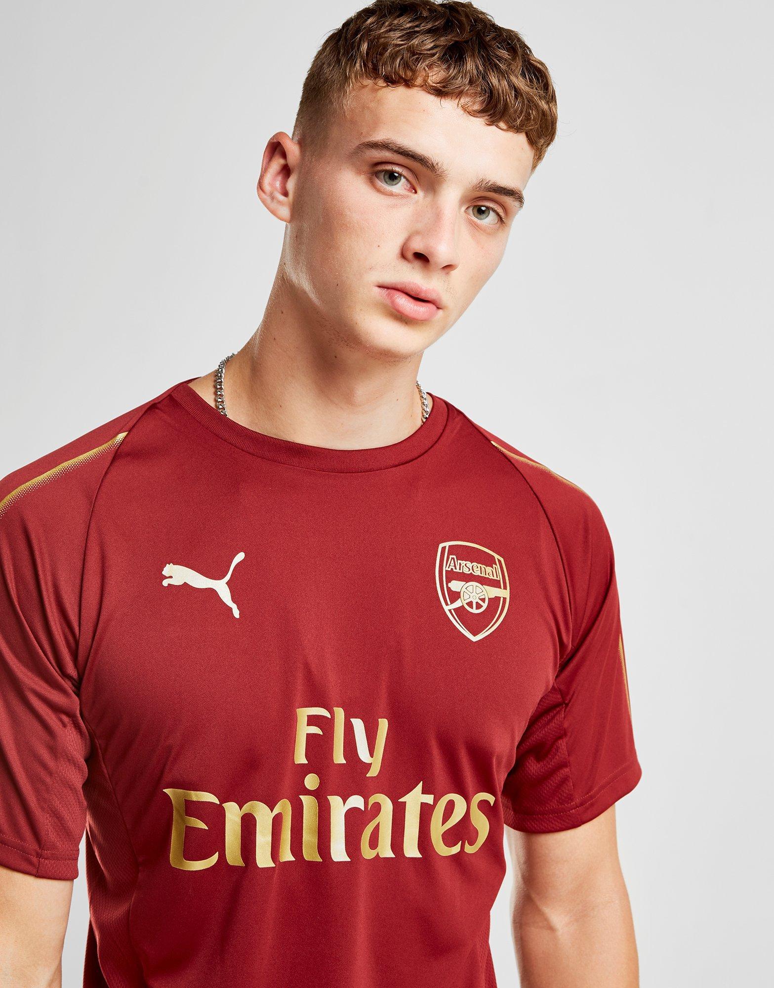 burgundy and gold puma shirt