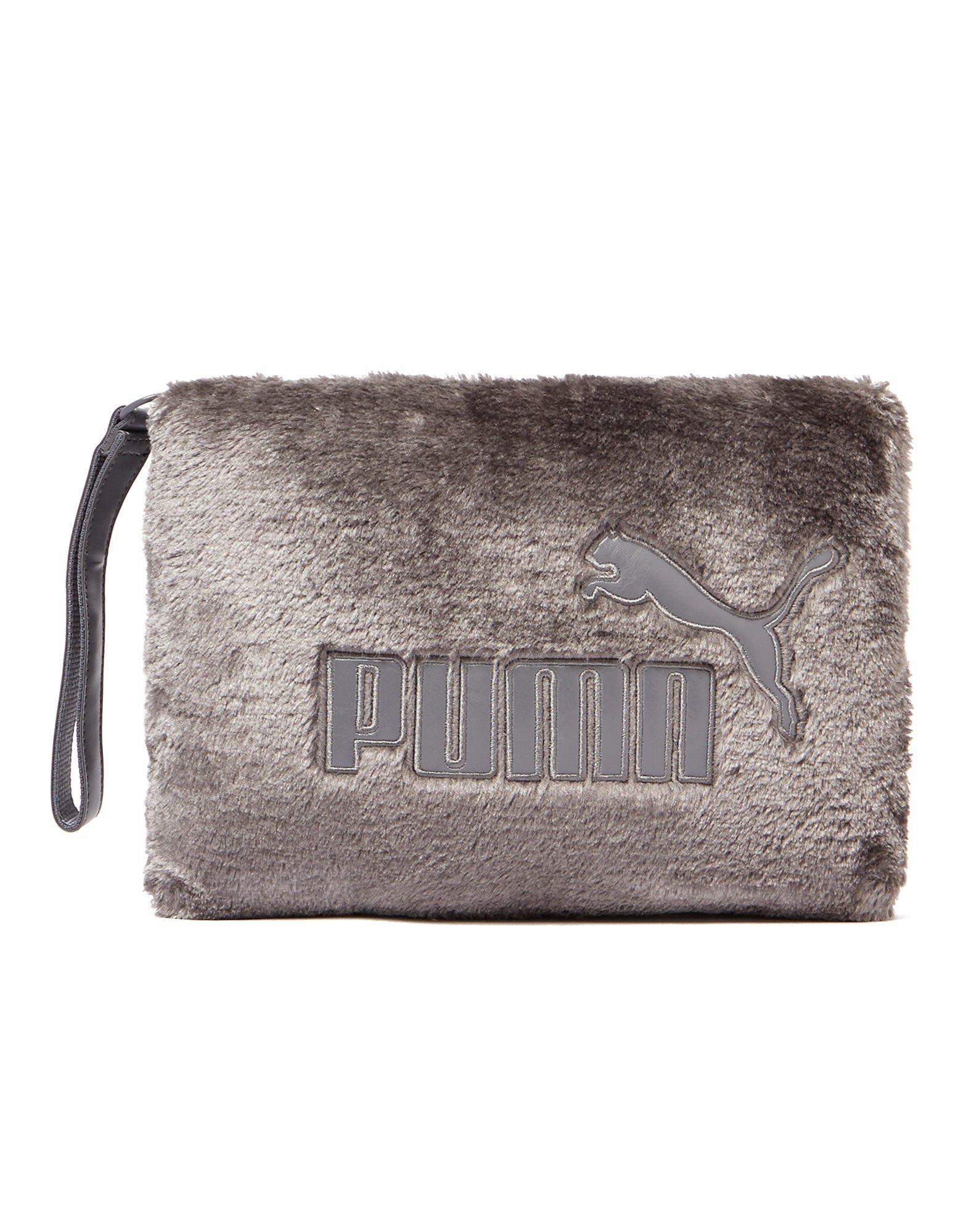 PUMA Fur Clutch Bag in Purple - Lyst