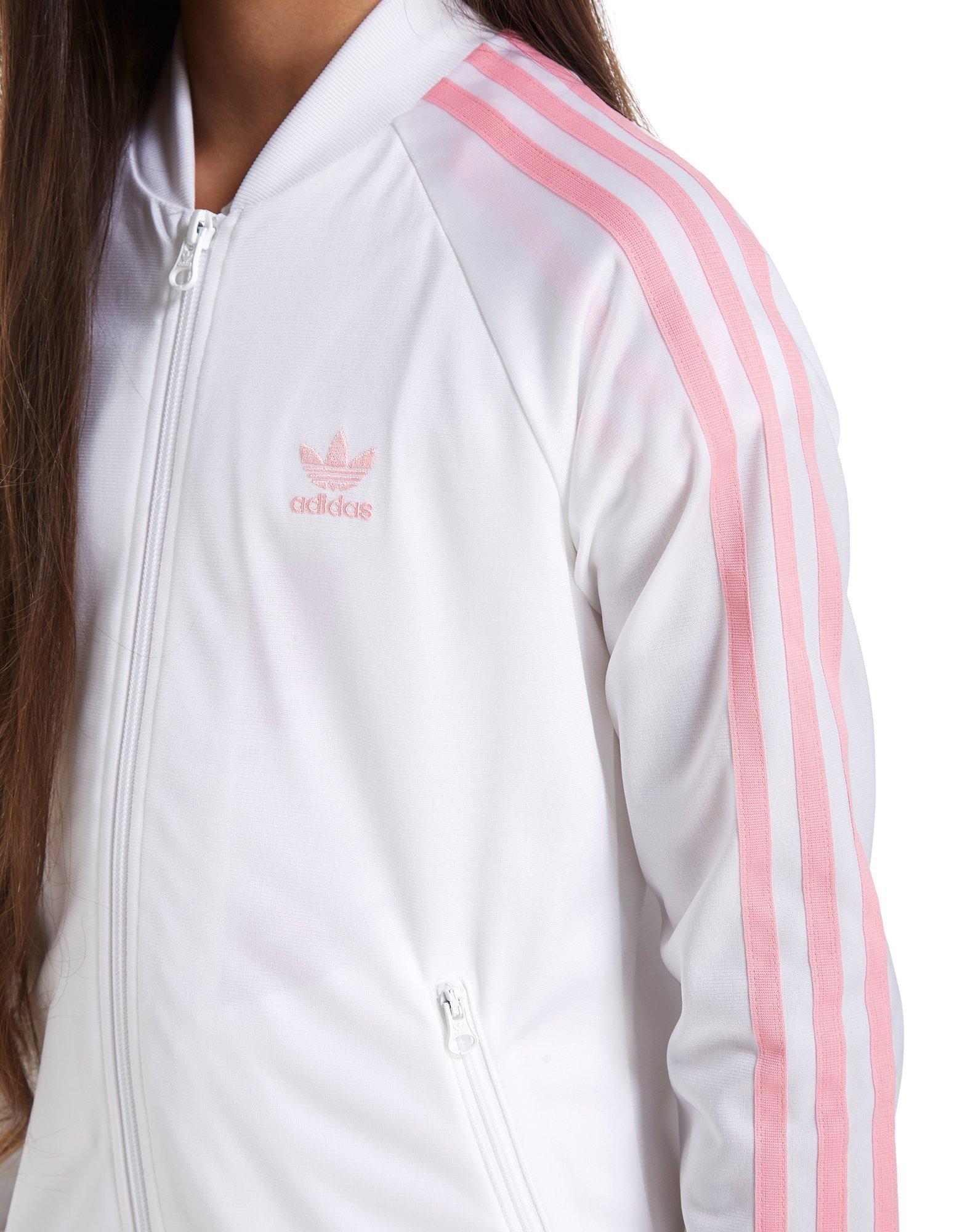 pink and white adidas track jacket