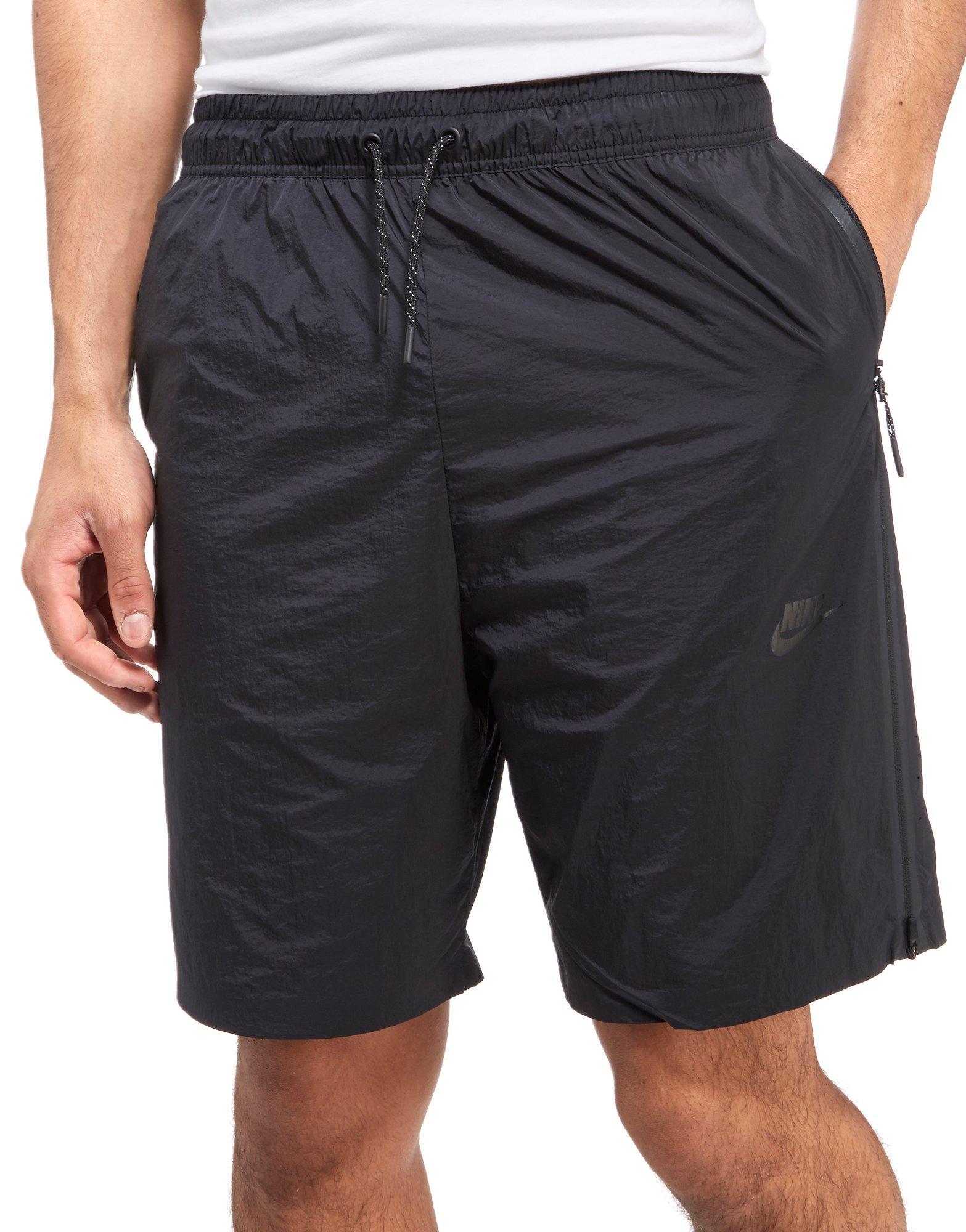 black nike tech shorts