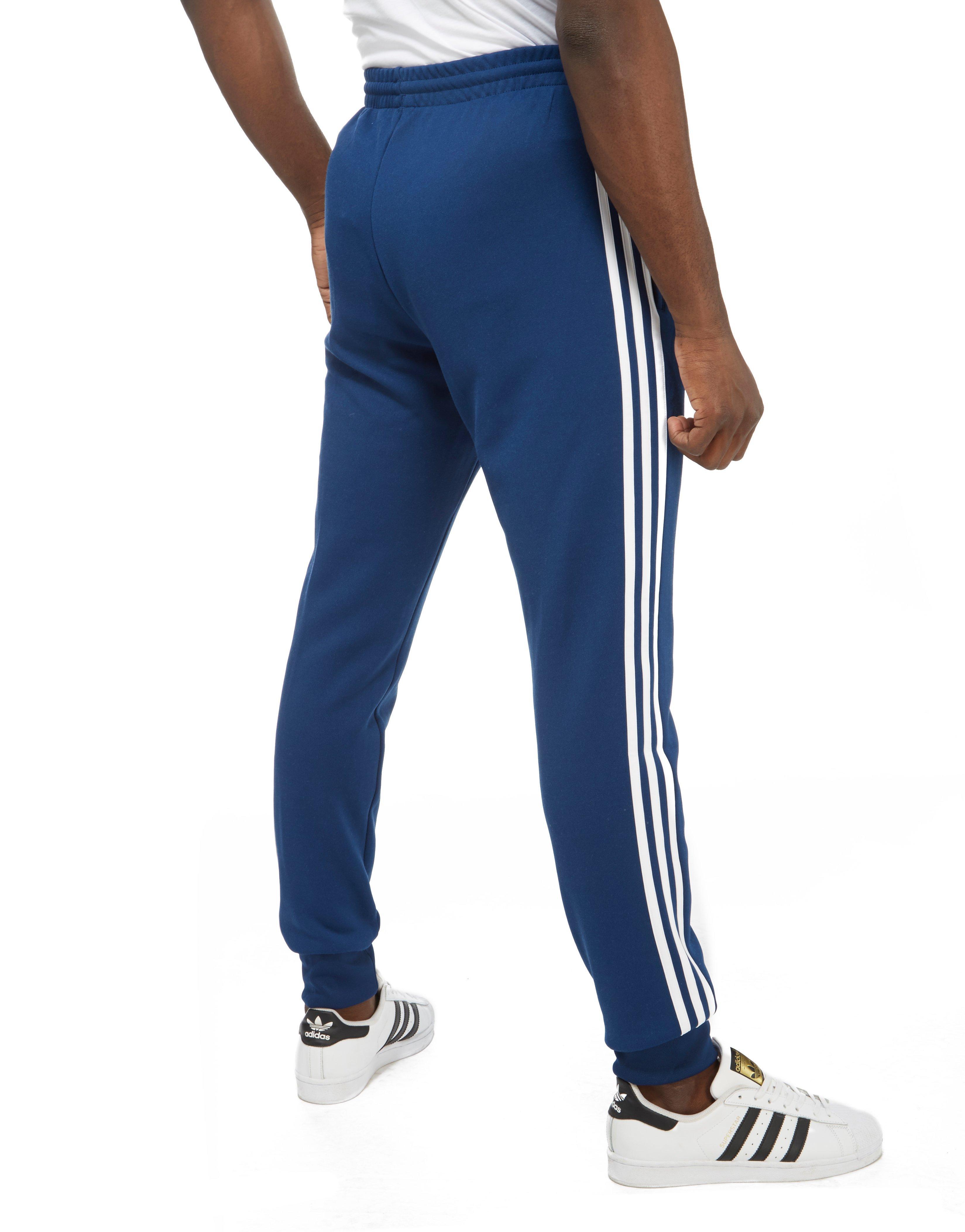 adidas 3 stripe blue track pants