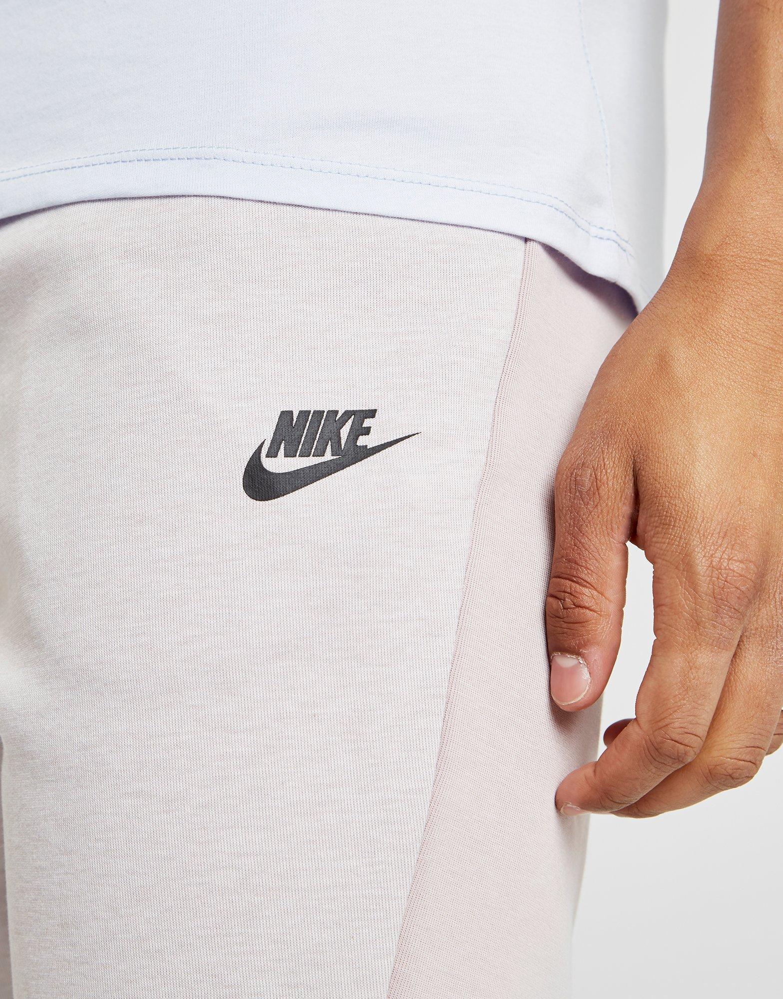 pink nike tech shorts