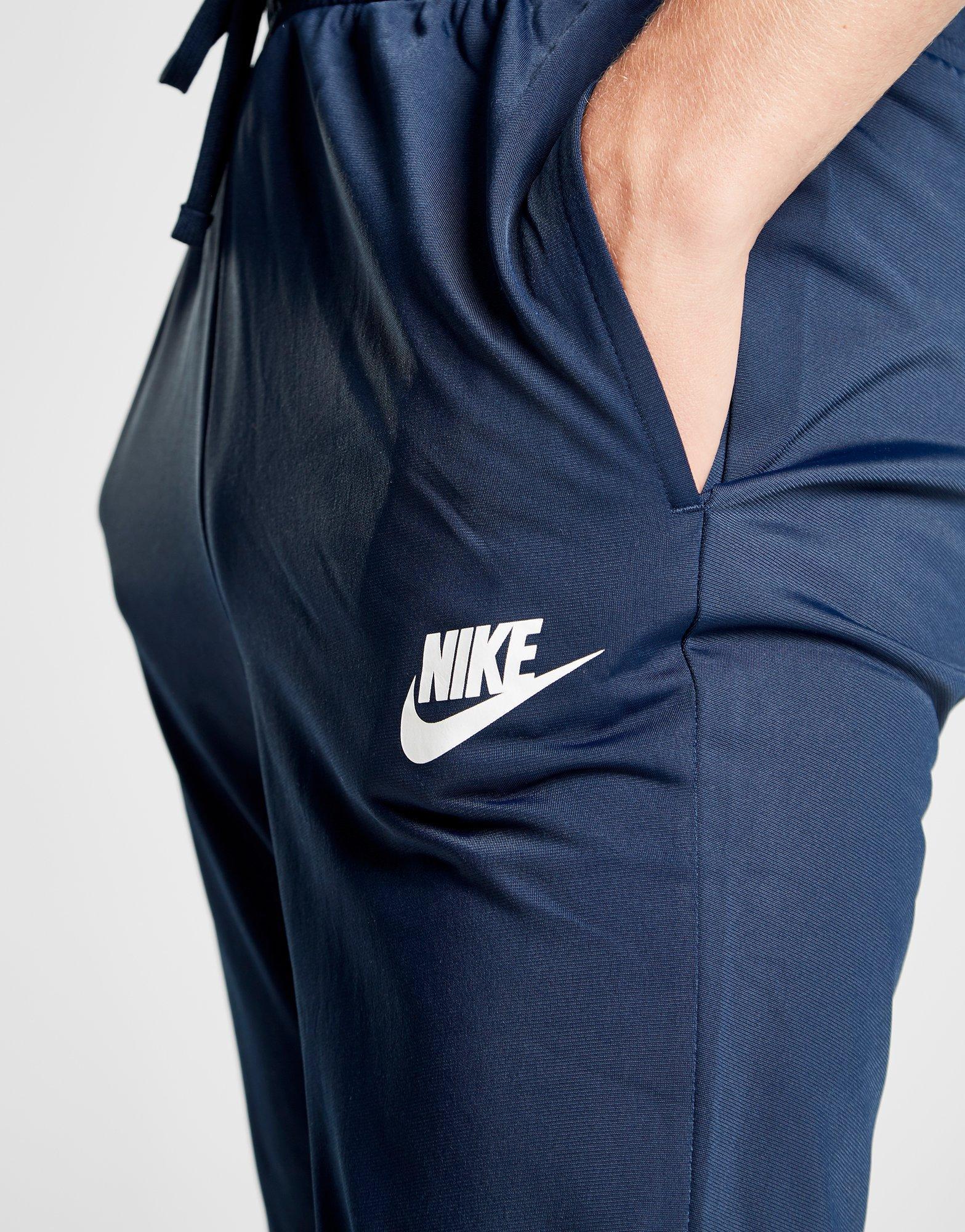 nike division poly track pants