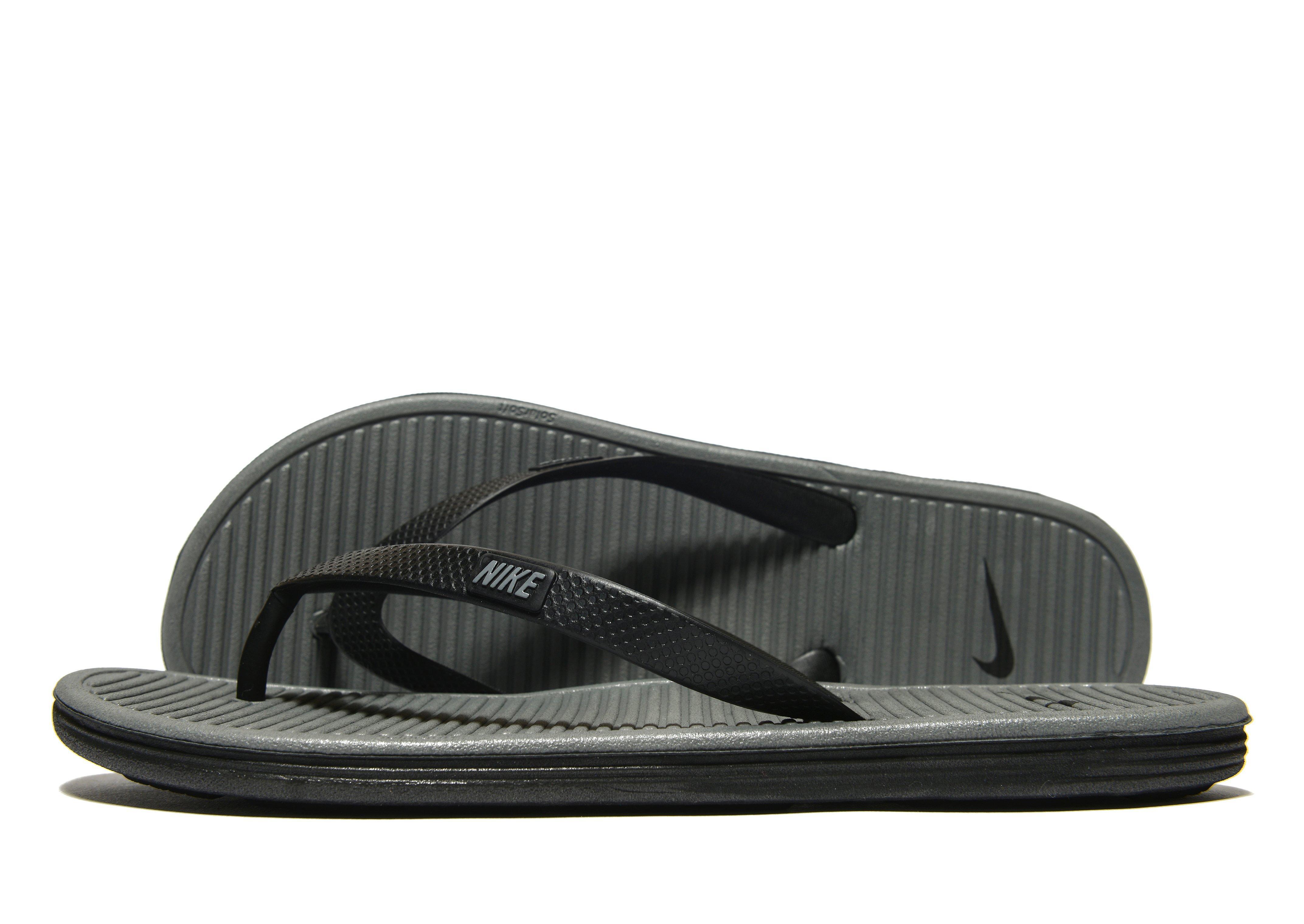 nike grey flip flops