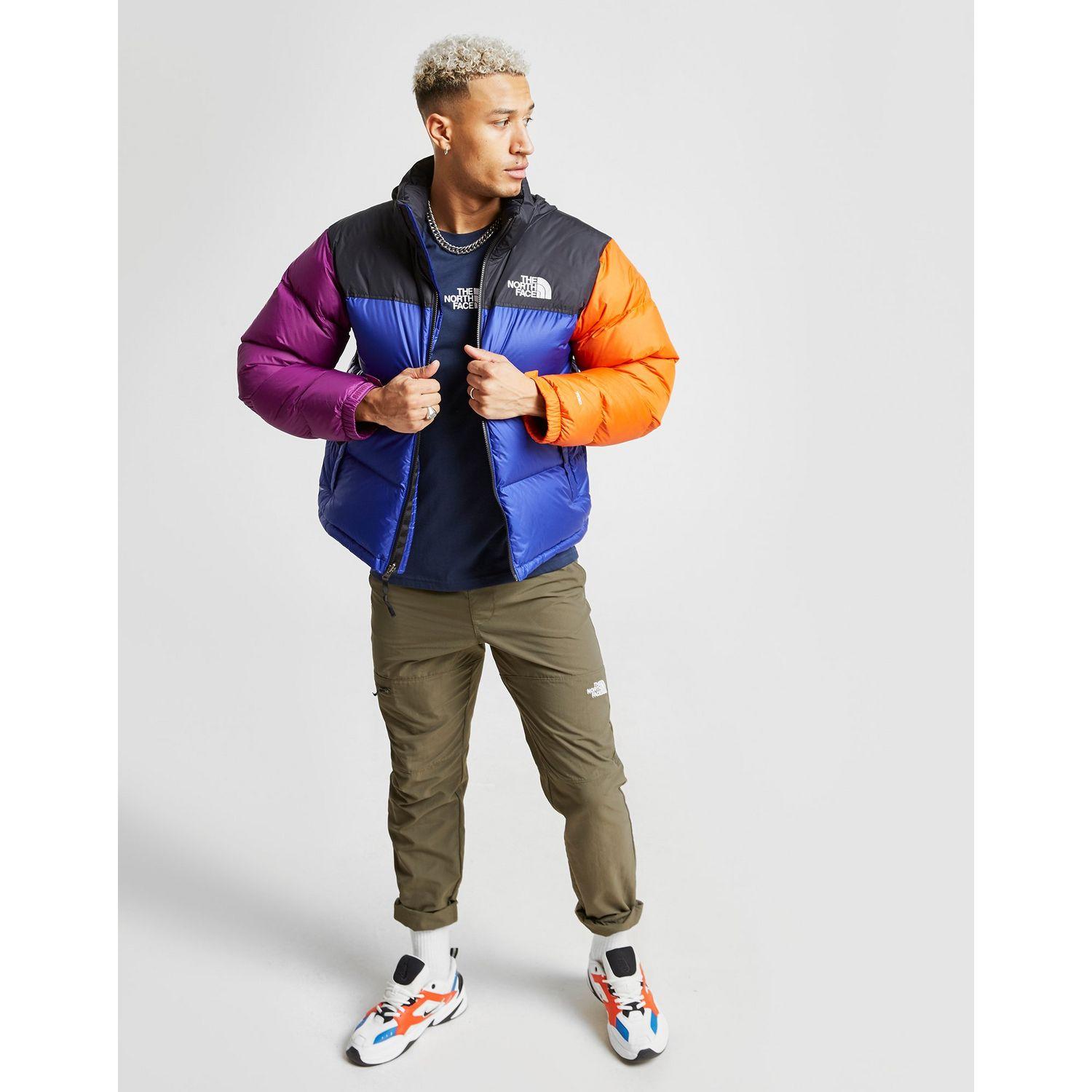 The North Face Synthetic Rage 96 Nuptse Jacket In Blue Black Yellow Purple Blue For Men Lyst