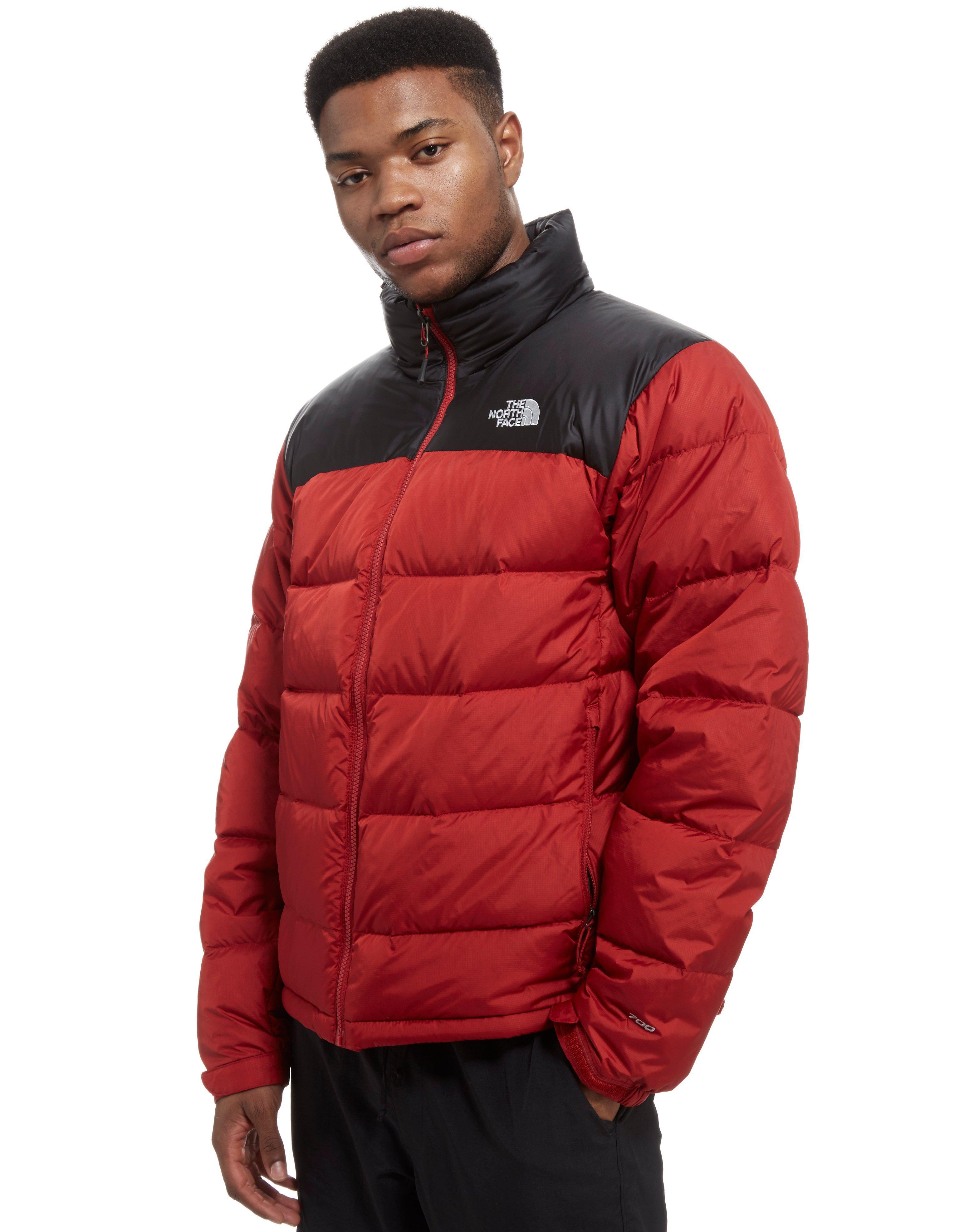 red and black north face nuptse jacket